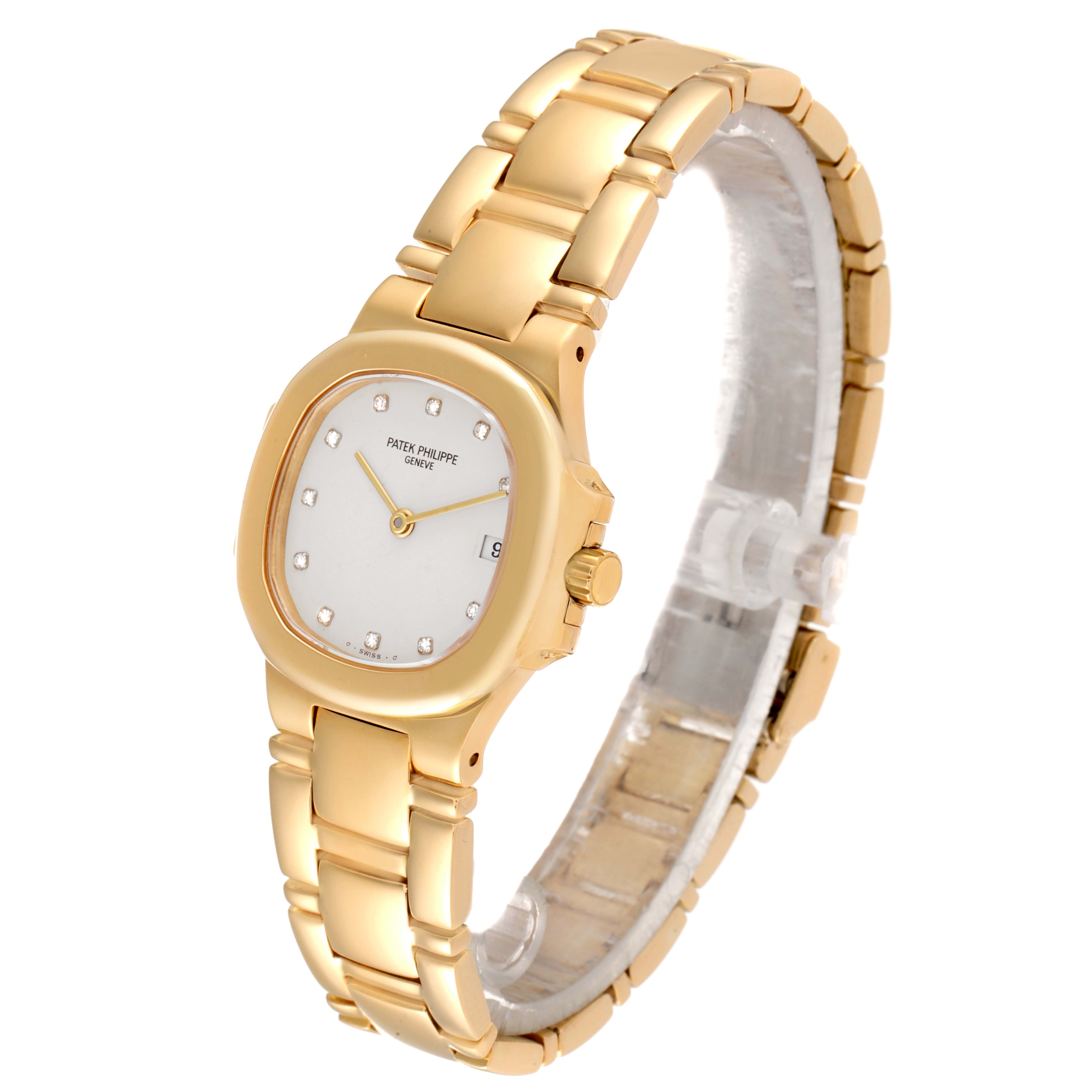 The image shows a Patek Philippe Nautilus 4700/1 Women's Yellow Gold Beige Dial 4700/1 Women's Yellow Gold Beige Dial watch angled from the front, displaying the watch face, bracelet, and crown.