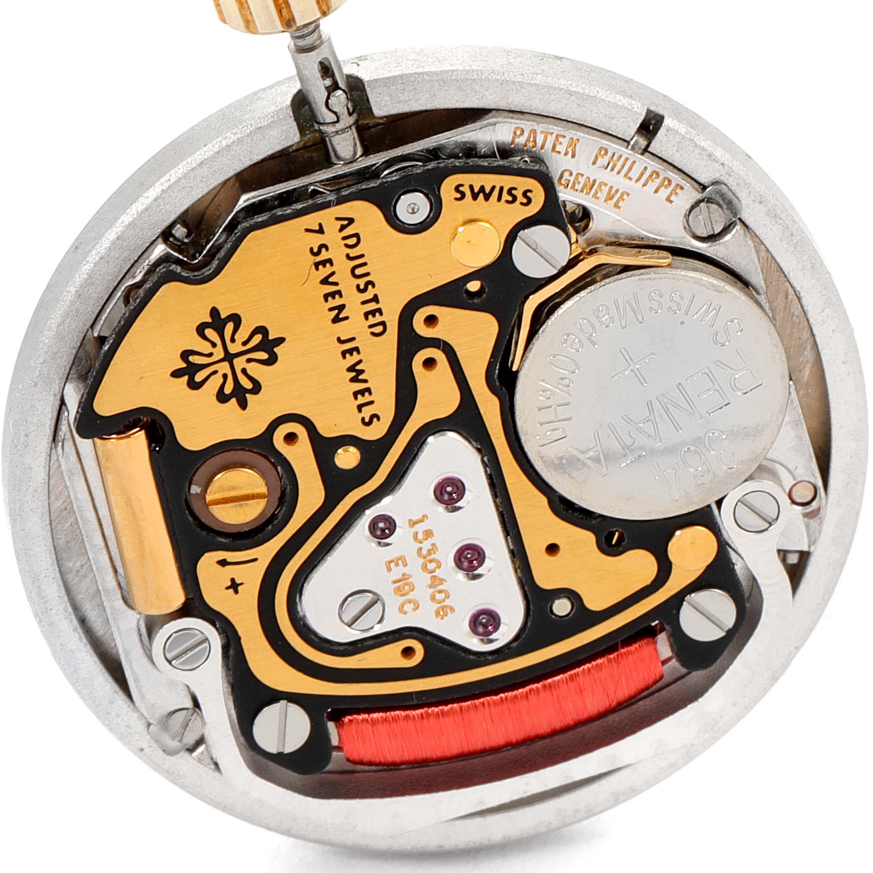 This image shows the intricate internal mechanism of the Patek Philippe Nautilus 4700/51 Women's Yellow Gold White Dial 4700/51 Women's Yellow Gold White Dial watch from an angled view.