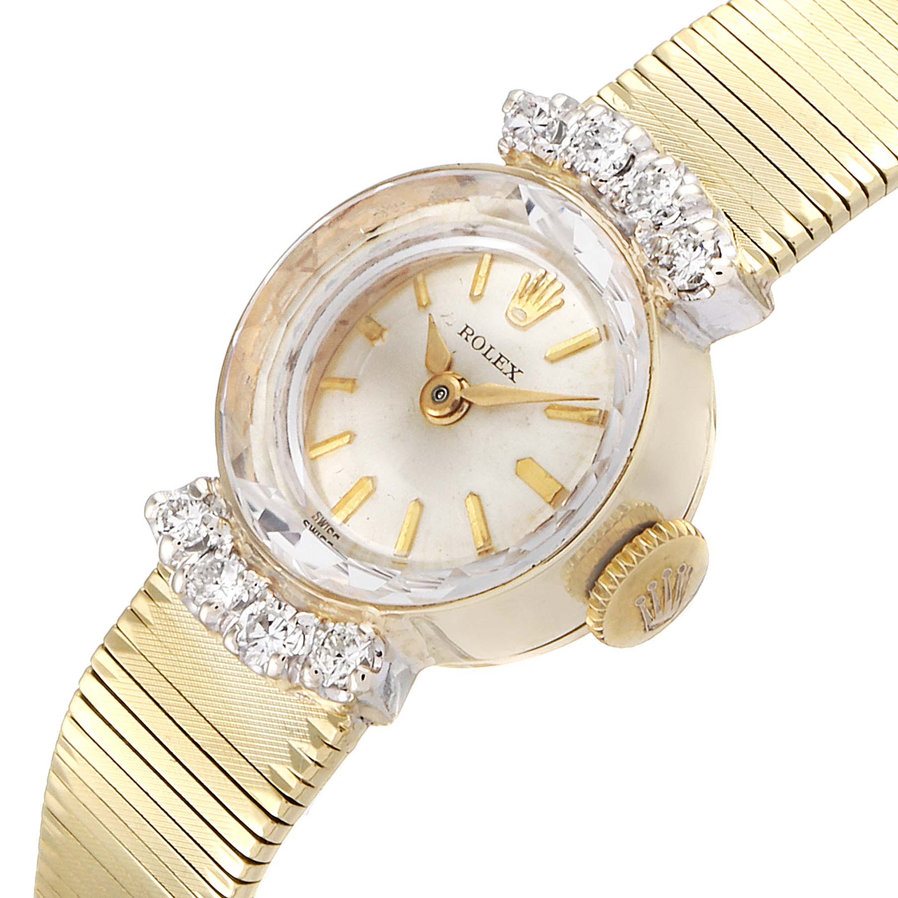 The image shows a close-up, angled view of a Rolex Cocktail  Women's Yellow Gold Silver Dial  Women's Yellow Gold Silver Dial model watch, highlighting its dial, crystal, crown, and bracelet.