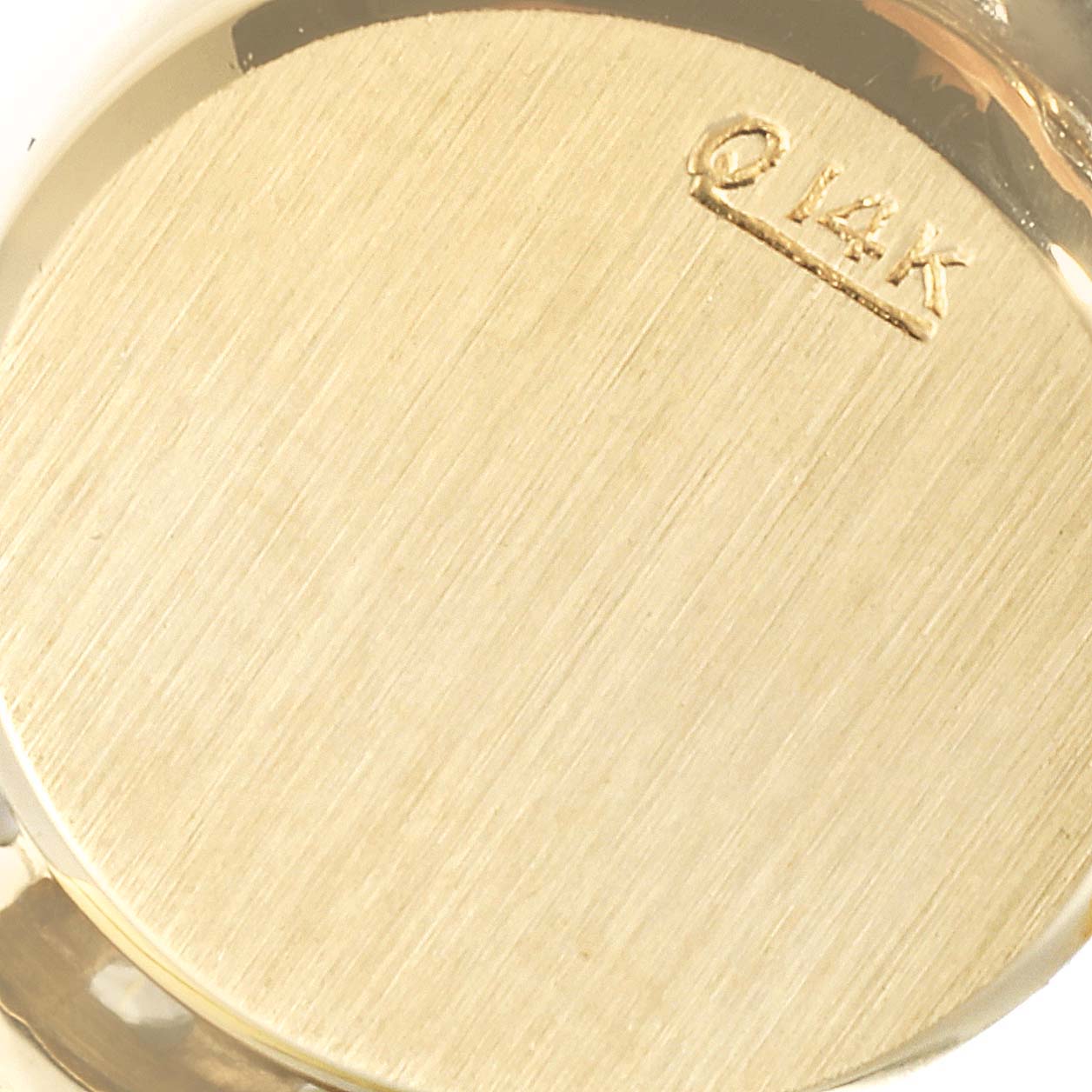 The image shows the back of the Rolex Cocktail  Women's Yellow Gold Silver Dial  Women's Yellow Gold Silver Dial model watch, highlighting its 14K gold case.