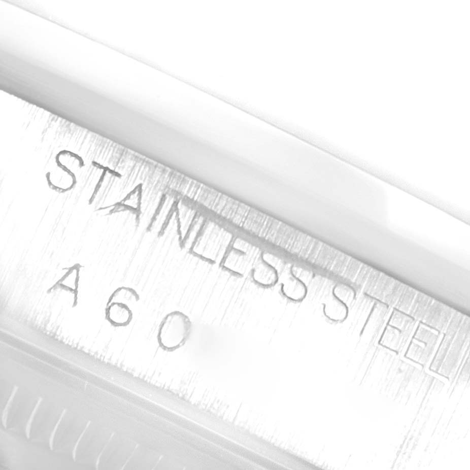 The image shows a close-up view of the stainless steel part of a Rolex Air-King 14000 Men's Stainless Steel Blue Dial 14000 Men's Stainless Steel Blue Dial watch, displaying the "STAINLESS STEEL" engraving.