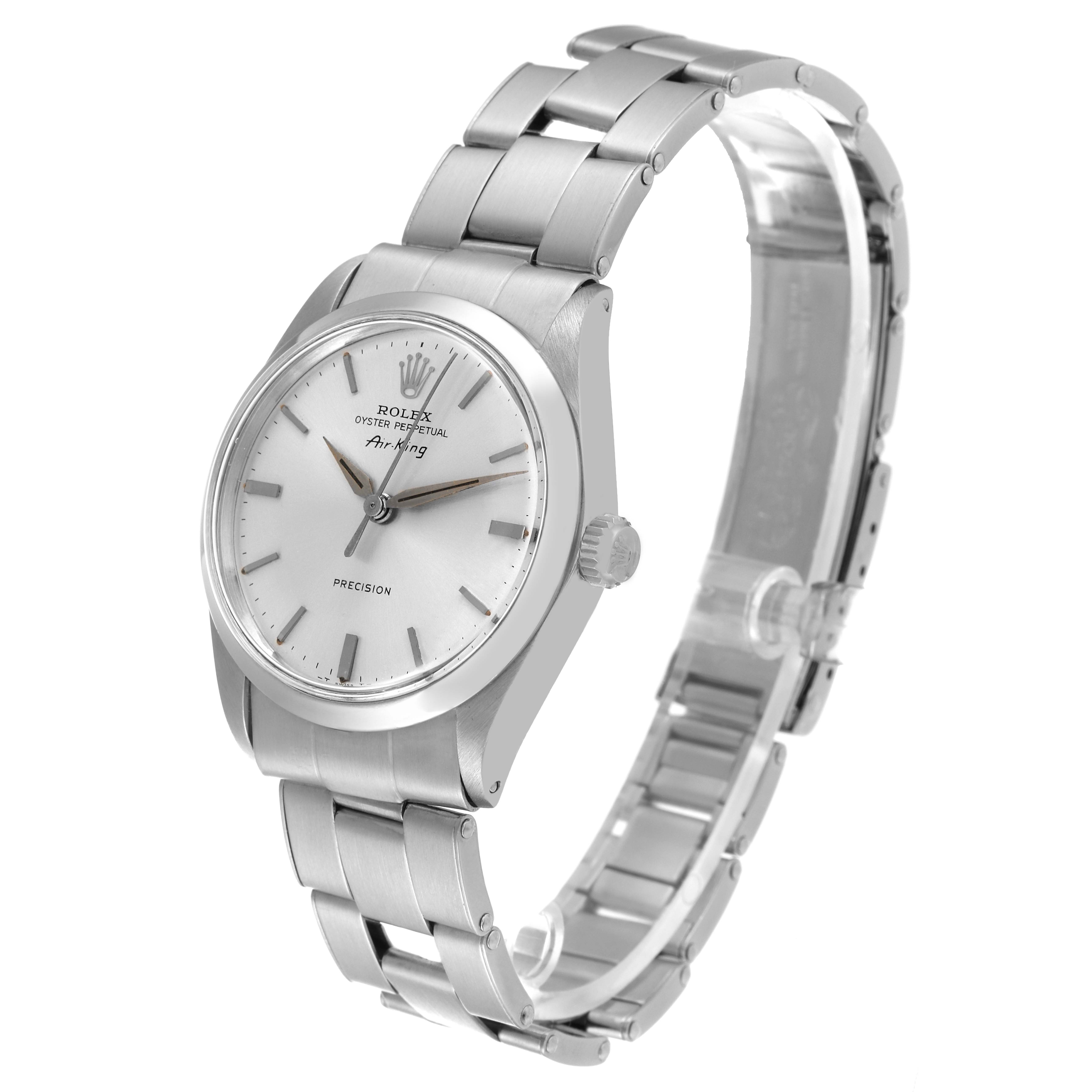 The image shows a side angle of the Rolex Air-King 5500 Men's Stainless Steel Silver Dial 5500 Men's Stainless Steel Silver Dial watch, highlighting its face, case, and stainless steel bracelet.