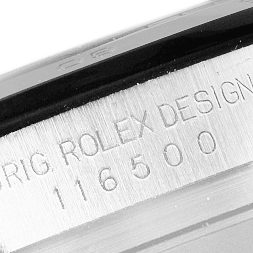 This close-up shows the engraved model number "116500" on the case of a Rolex Daytona 116500 Men's Stainless Steel Black Dial 116500 Men's Stainless Steel Black Dial watch.