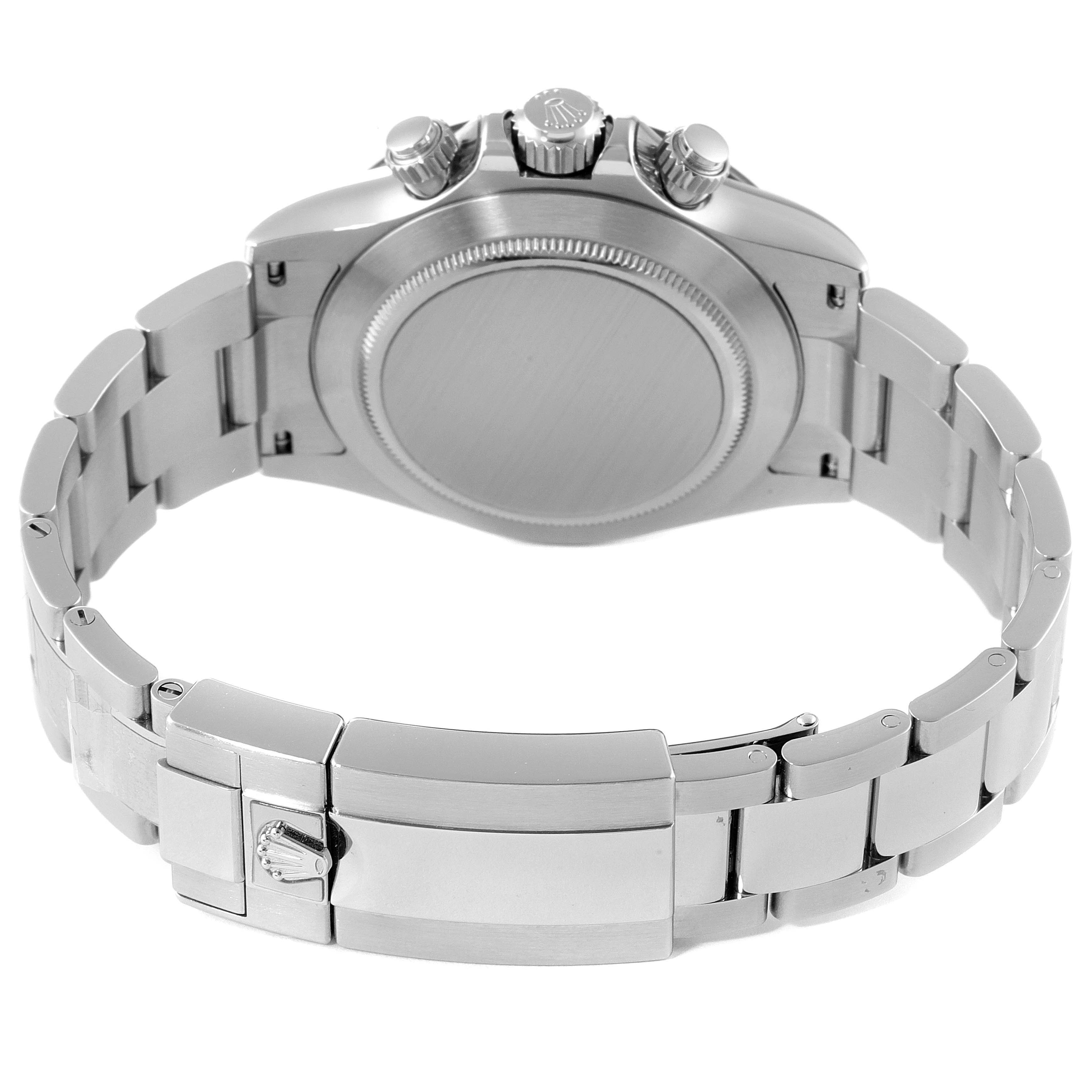 The image shows the back case, crown, pushers, and bracelet of a Rolex Daytona 116500 Men's Stainless Steel Black Dial 116500 Men's Stainless Steel Black Dial watch.