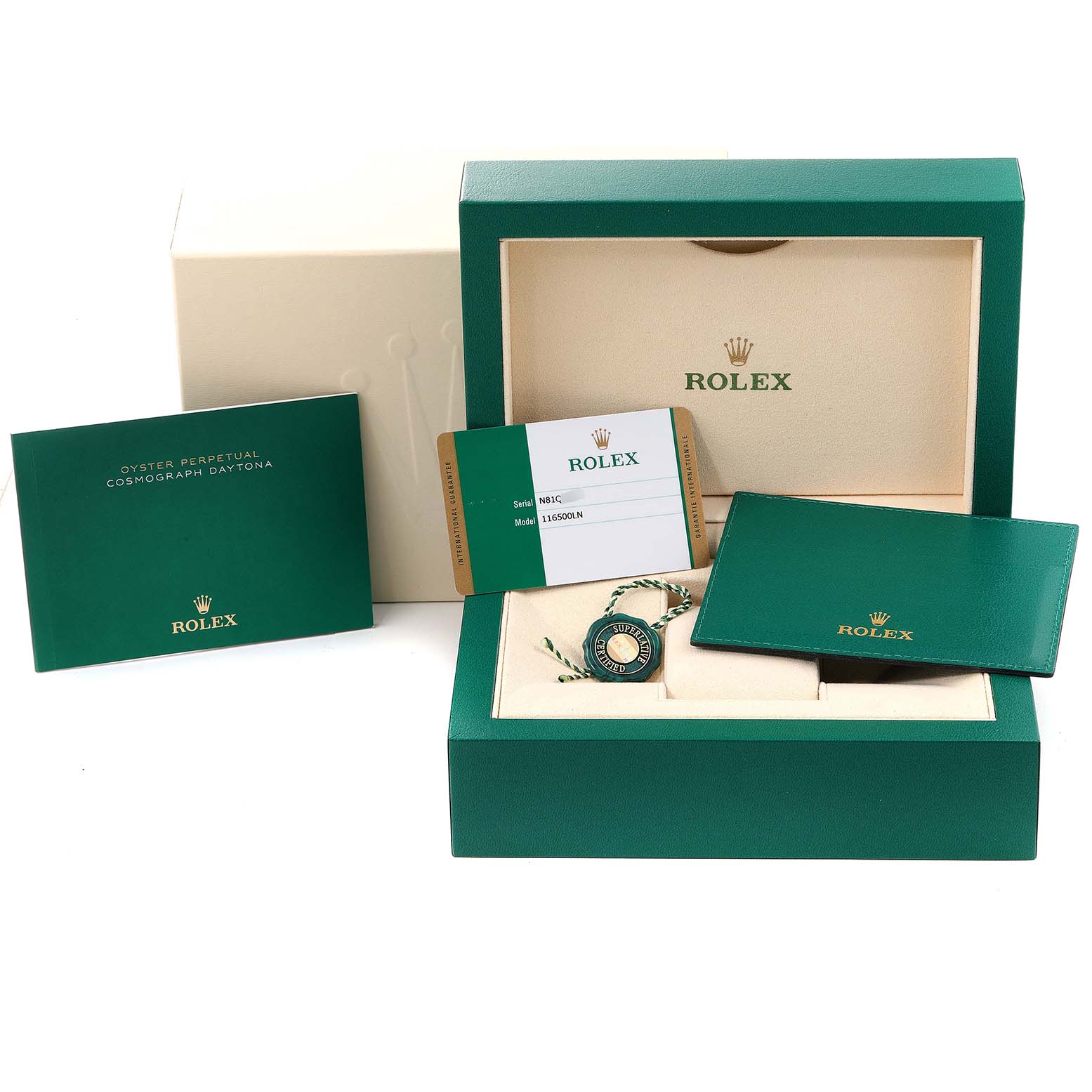 The image shows the packaging and accessories of a Rolex Daytona 116500 Men's Stainless Steel Black Dial 116500 Men's Stainless Steel Black Dial, including the box, manual, warranty card, and tag.