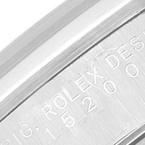 This image shows a close-up view of the engraving on the inner bezel of a Rolex Datejust 15200 Men's Stainless Steel Blue Dial 15200 Men's Stainless Steel Blue Dial watch.