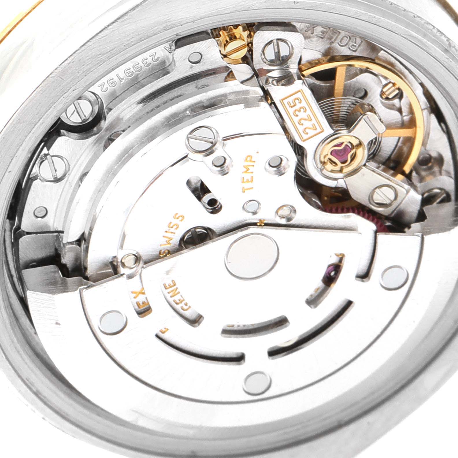 This image shows a detailed view of the movement mechanism of a Rolex Datejust 179173 Women
s Steel and Gold (two tone) Champagne Dial 179173 Women
s Steel and Gold (two tone) Champagne Dial watch.