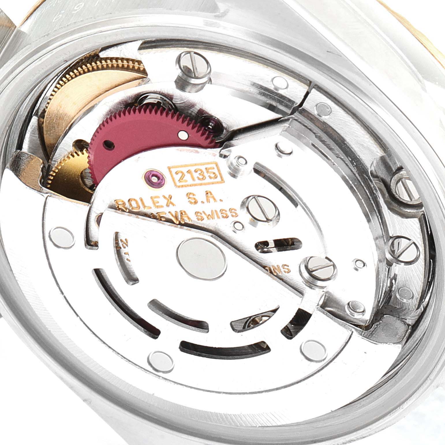 The image shows the Rolex Datejust 69173 Women
s Steel and Gold (two tone) Champagne Dial 69173 Women
s Steel and Gold (two tone) Champagne Dial watch movement, viewed from the back, highlighting its intricate gears and inscriptions.