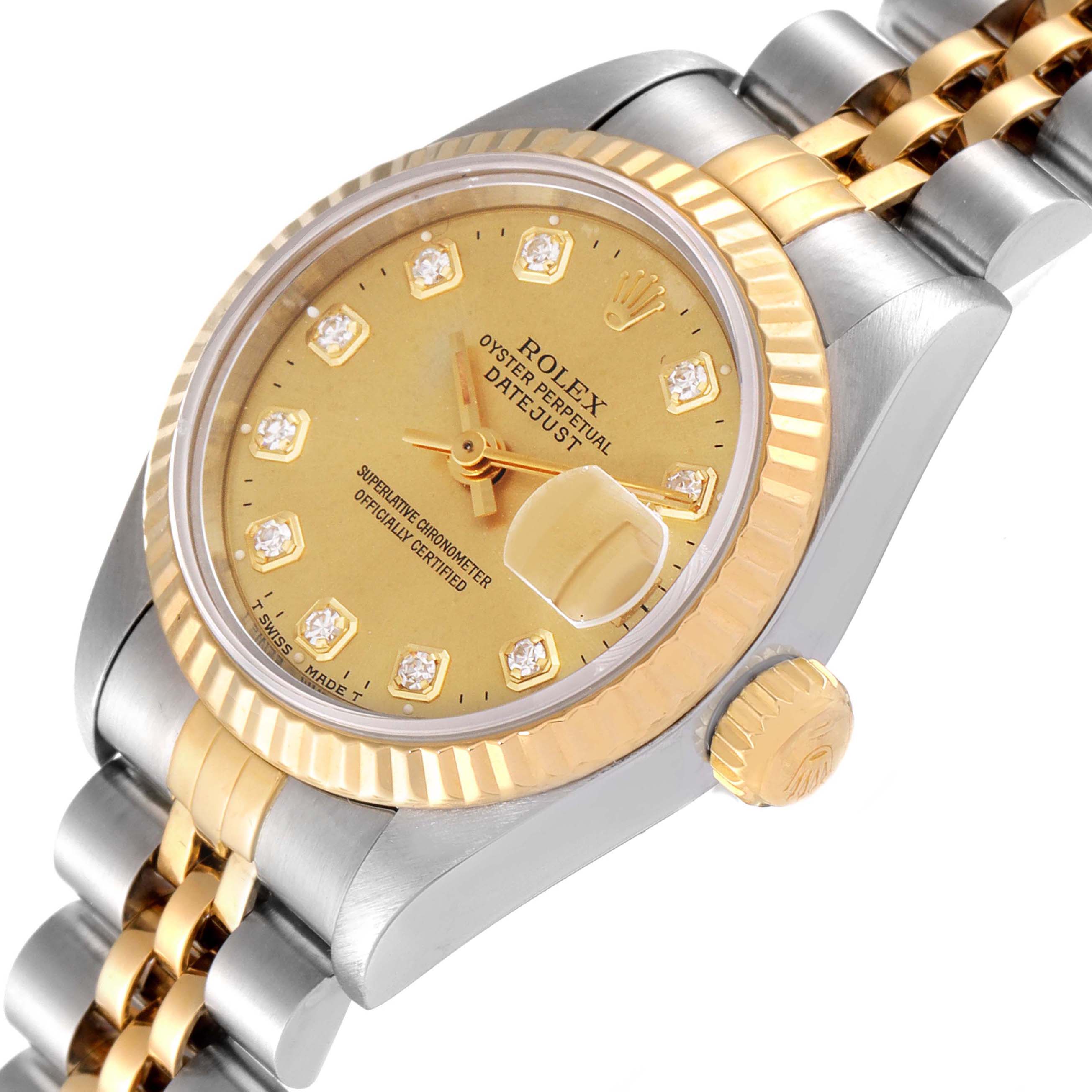 This image shows a close-up angle of the Rolex Datejust 69173 Women
s Steel and Gold (two tone) Champagne Dial 69173 Women
s Steel and Gold (two tone) Champagne Dial watch, highlighting the gold dial, bezel, and two-tone bracelet.