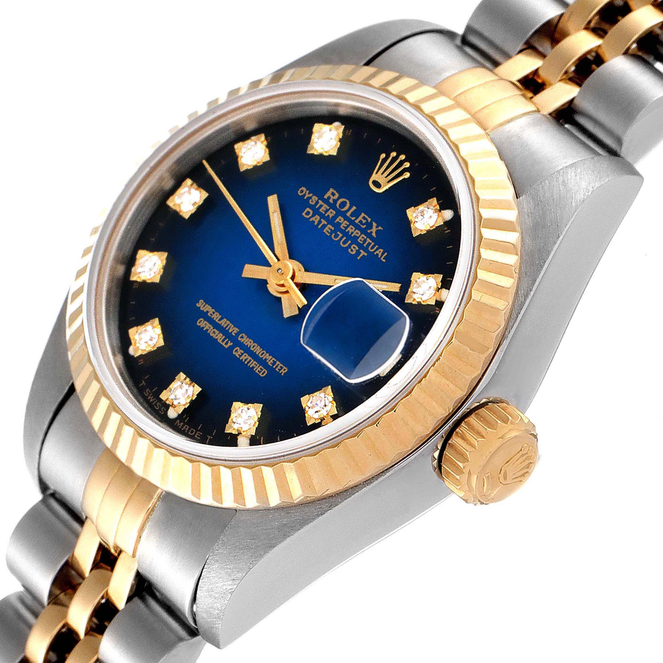 The image shows a close-up angle of the Rolex Datejust 69173 Women's Steel and Gold (two tone) Blue Dial 69173 Women's Steel and Gold (two tone) Blue Dial watch, highlighting its dial, crown, bezel, and part of the bracelet.