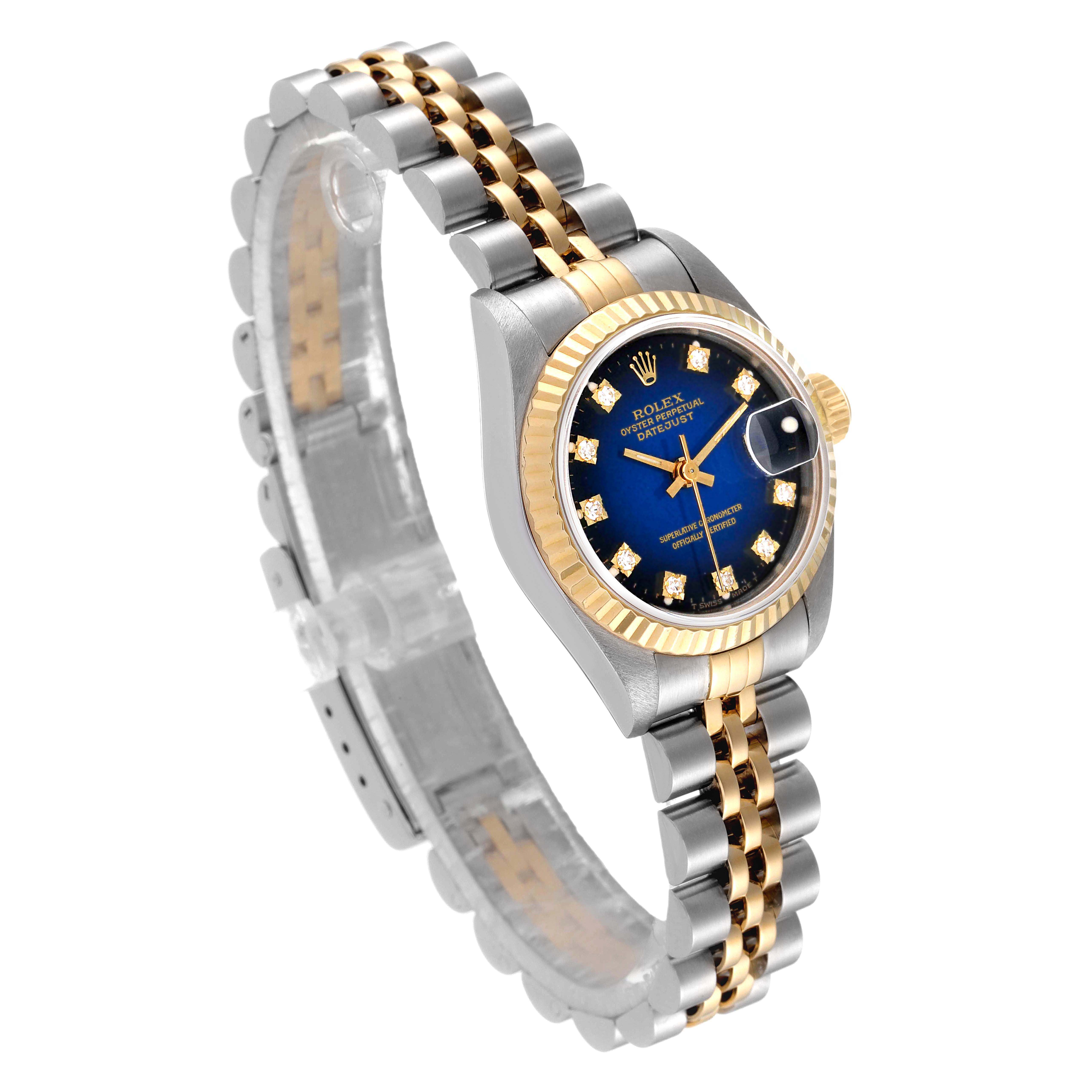 The image shows a Rolex Datejust 69173 Women's Steel and Gold (two tone) Blue Dial 69173 Women's Steel and Gold (two tone) Blue Dial watch at an angled view, highlighting its blue dial, bezel, and two-tone bracelet.