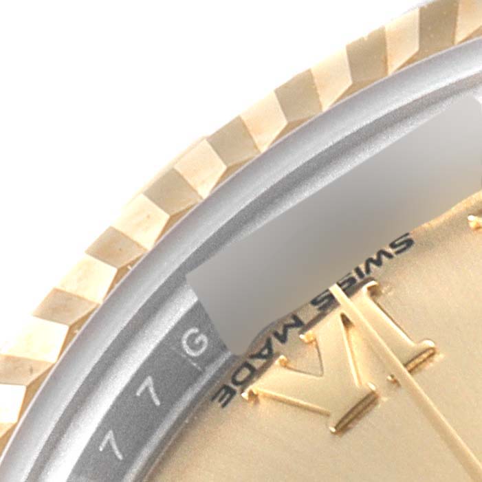 This image shows a close-up of the bezel and partial dial of a Rolex Datejust 279173 Women
s Steel and Gold (two tone) Champagne Dial 279173 Women
s Steel and Gold (two tone) Champagne Dial watch.