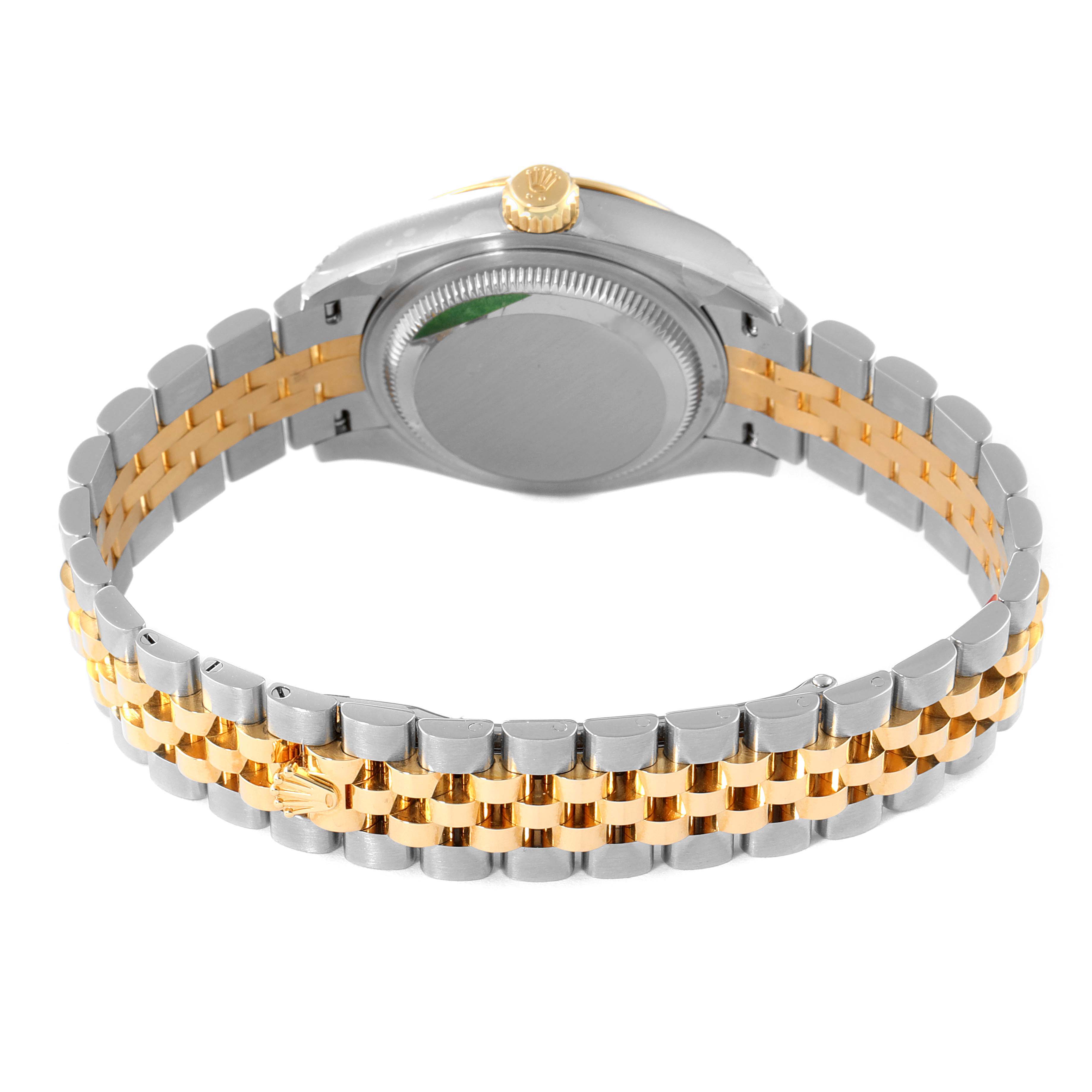 The image shows the back view of a Rolex Datejust 279173 Women
s Steel and Gold (two tone) Champagne Dial 279173 Women
s Steel and Gold (two tone) Champagne Dial watch, highlighting its two-tone bracelet and the case back.