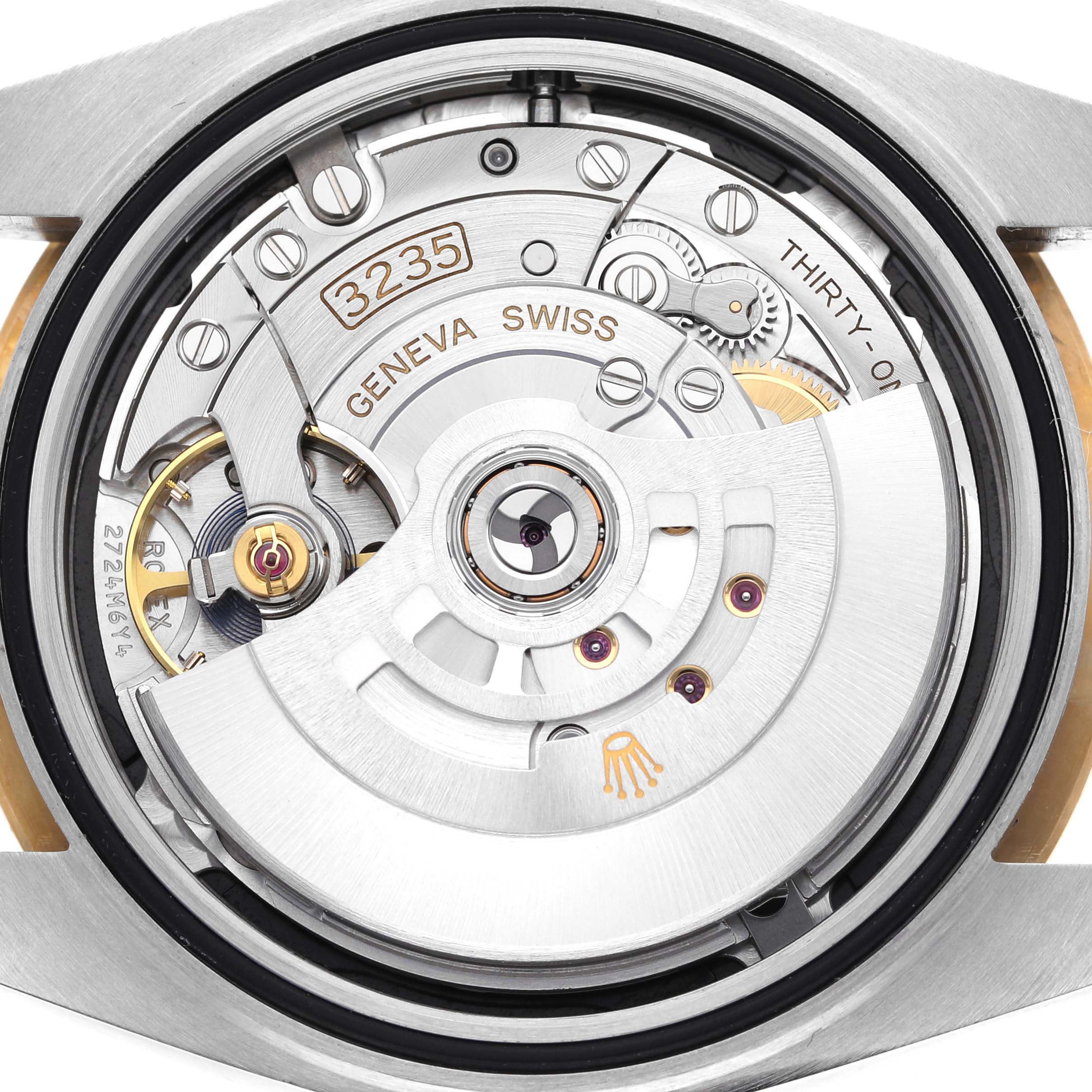 This image shows the detailed back view of the Rolex Datejust 41 126333 Men's Steel and Gold (two tone) Black Dial 126333 Men's Steel and Gold (two tone) Black Dial watch, revealing its intricate movement and components.