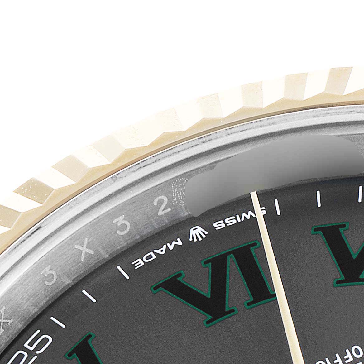 This image shows a close-up of the bezel, a portion of the dial, and part of the "Swiss Made" text on the Rolex Datejust 41 126333 Men's Steel and Gold (two tone) Grey Dial 126333 Men's Steel and Gold (two tone) Grey Dial watch.