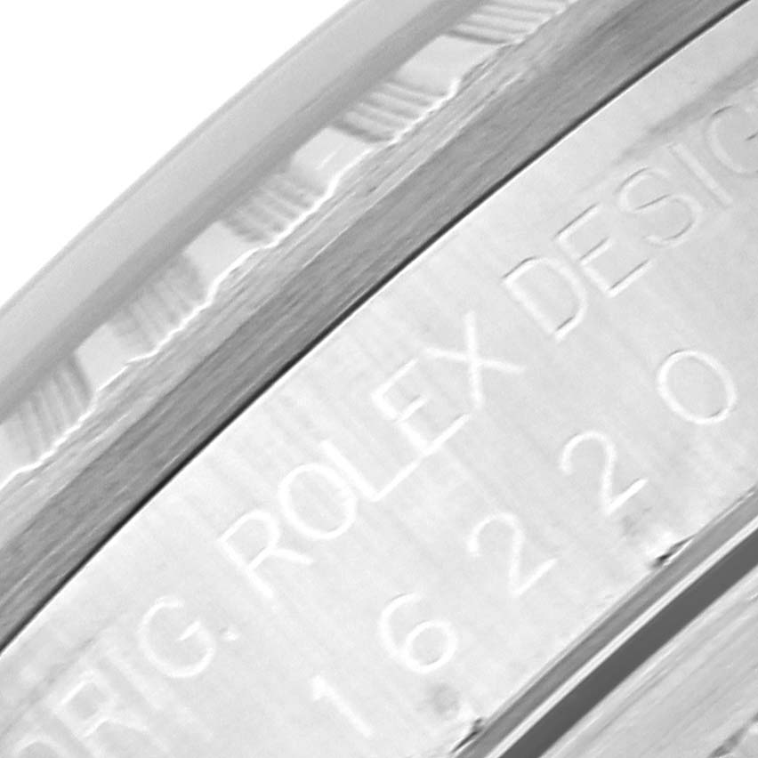 This image shows a close-up of the caseback edge, featuring the engraving of the Rolex Datejust 16220 Men's Stainless Steel Blue Dial 16220 Men's Stainless Steel Blue Dial model.