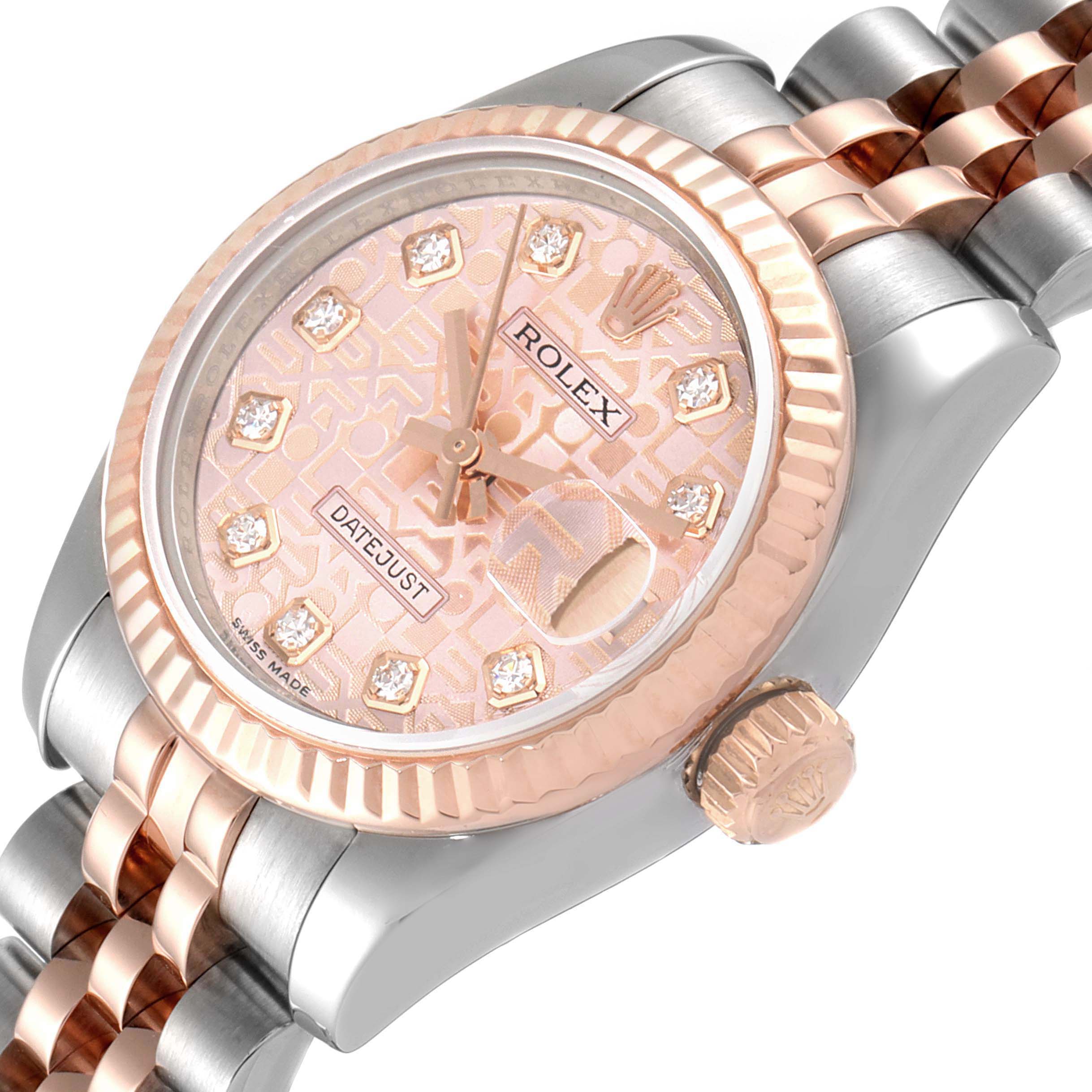 The Rolex Datejust 179171 Women's Steel and Gold (two tone) Pink Dial 179171 Women's Steel and Gold (two tone) Pink Dial watch is shown at a three-quarter angle, highlighting the dial, bezel, crown, and part of the bracelet.