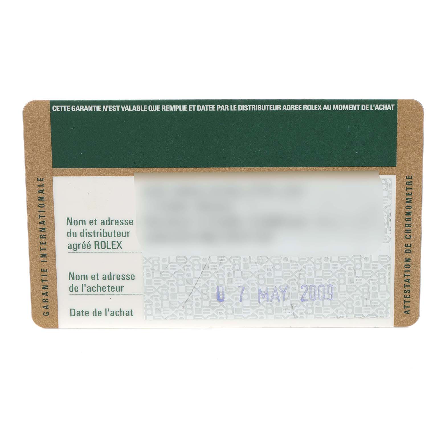 This image shows the warranty card for a Rolex Datejust 179171 Women's Steel and Gold (two tone) Pink Dial 179171 Women's Steel and Gold (two tone) Pink Dial watch from a top-down angle.