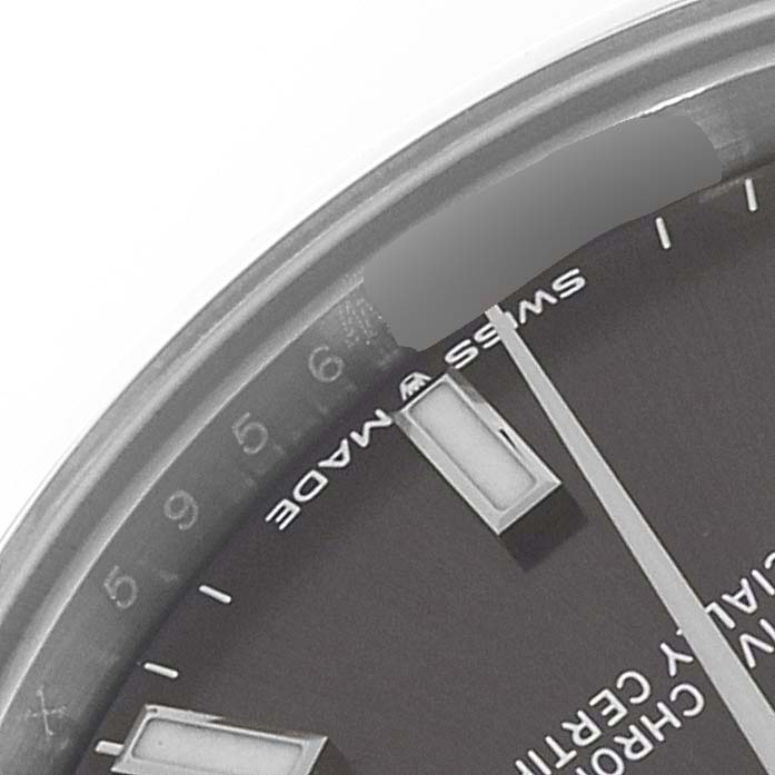 The image shows a close-up of the top left part of a Rolex Mid-Size 278240 Women's Stainless Steel Grey Dial 278240 Women's Stainless Steel Grey Dial watch, including the bezel, dial, and hour markers.