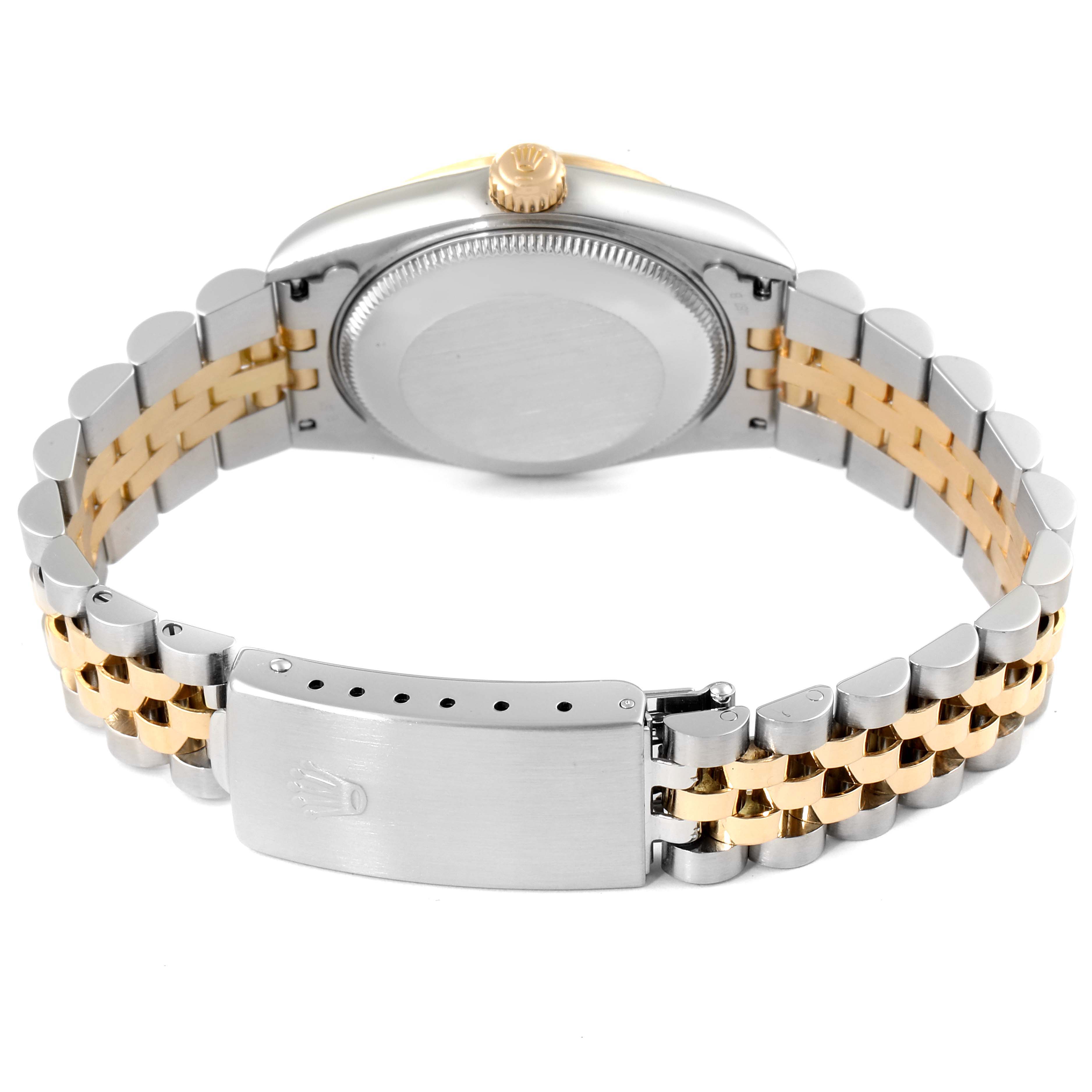 This image shows the back of a Rolex Mid-Size 78273 Women
s Steel and Gold (two tone) Silver Dial 78273 Women
s Steel and Gold (two tone) Silver Dial model watch, highlighting its case back, crown, and two-tone bracelet with clasp.