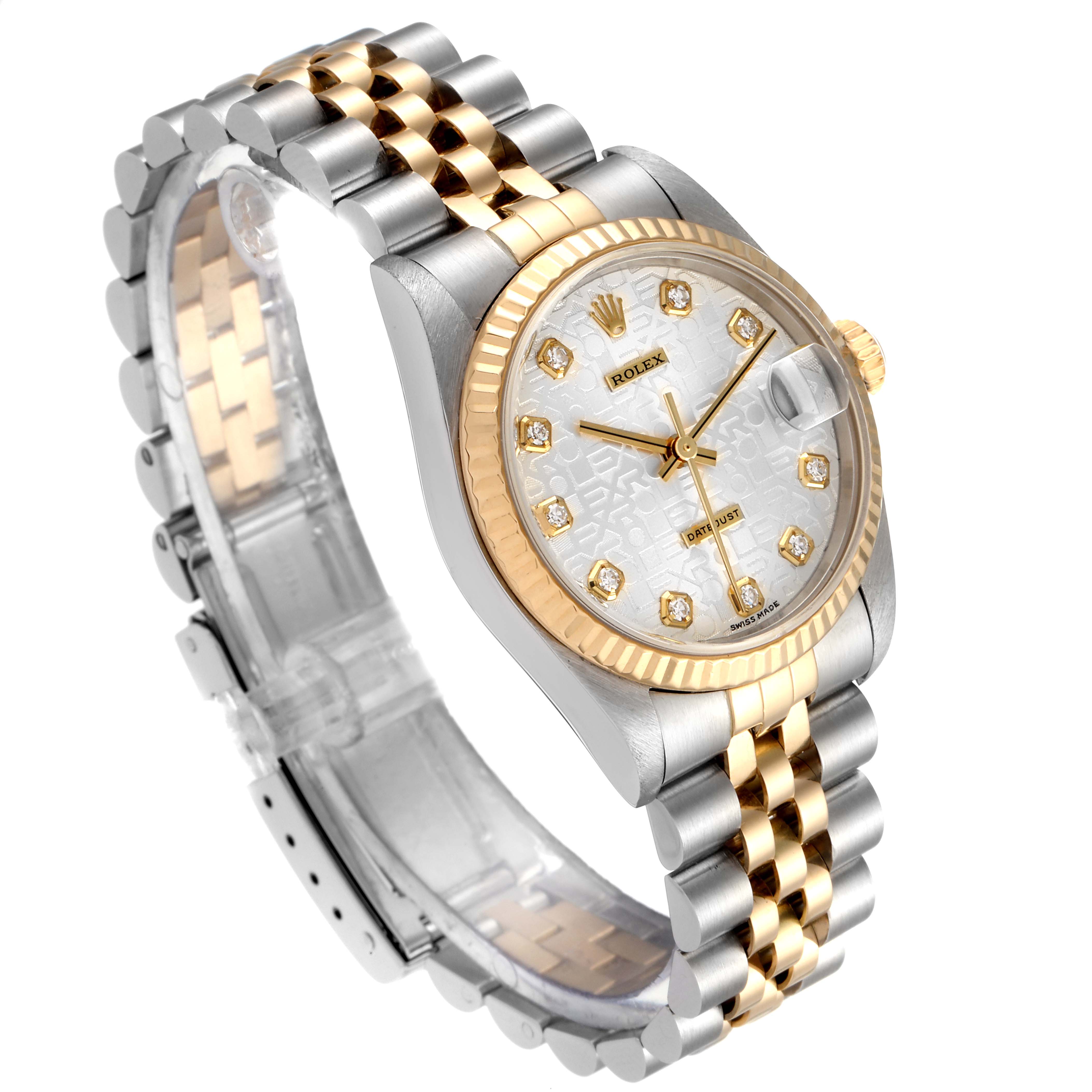 The image shows a Mid-Size Rolex watch viewed from an angled perspective, highlighting its bracelet, bezel, and dial.
