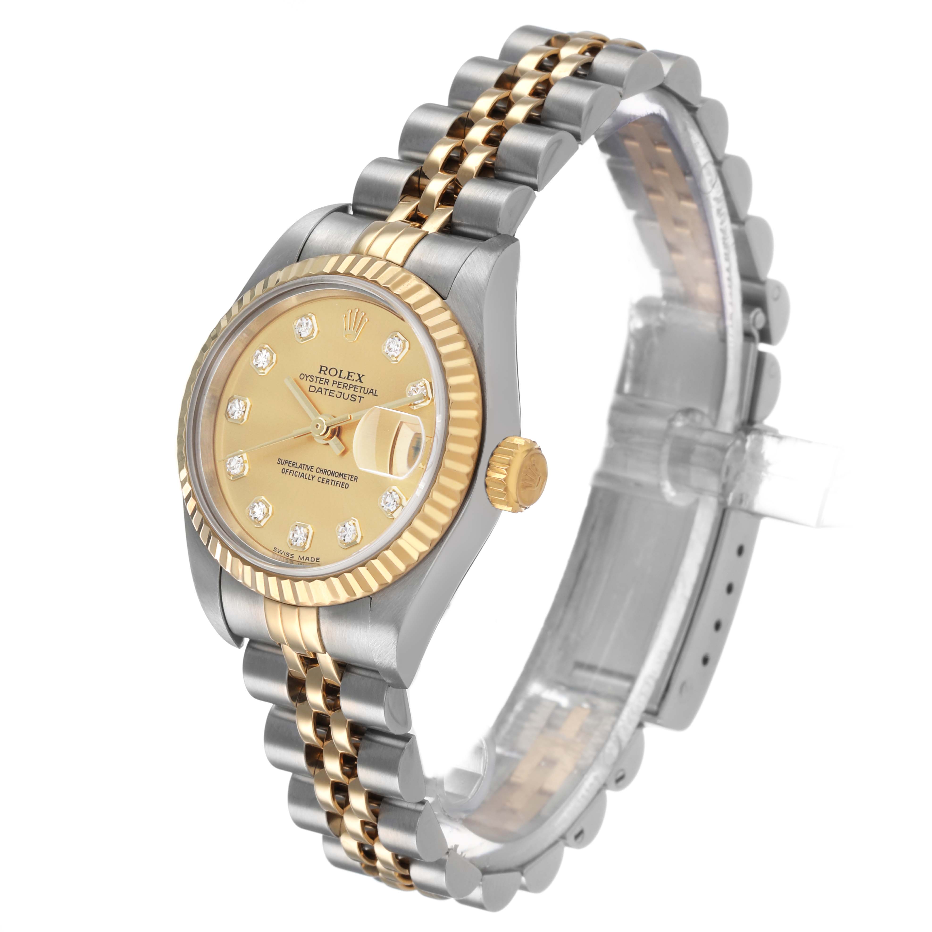 The Rolex Datejust 79173 Women's Steel and Gold (two tone) Champagne Dial watch is shown at a three-quarter angle, highlighting the face, bezel, crown, and two-tone bracelet.