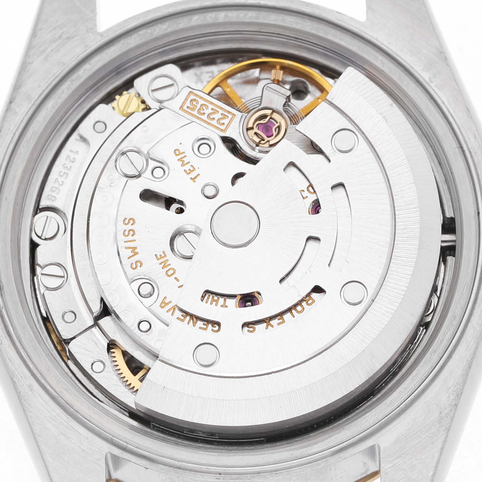 The image shows the movement of a Rolex Datejust 79173 Women's Steel and Gold (two tone) Champagne Dial watch from the back, highlighting the rotor and mechanical components.