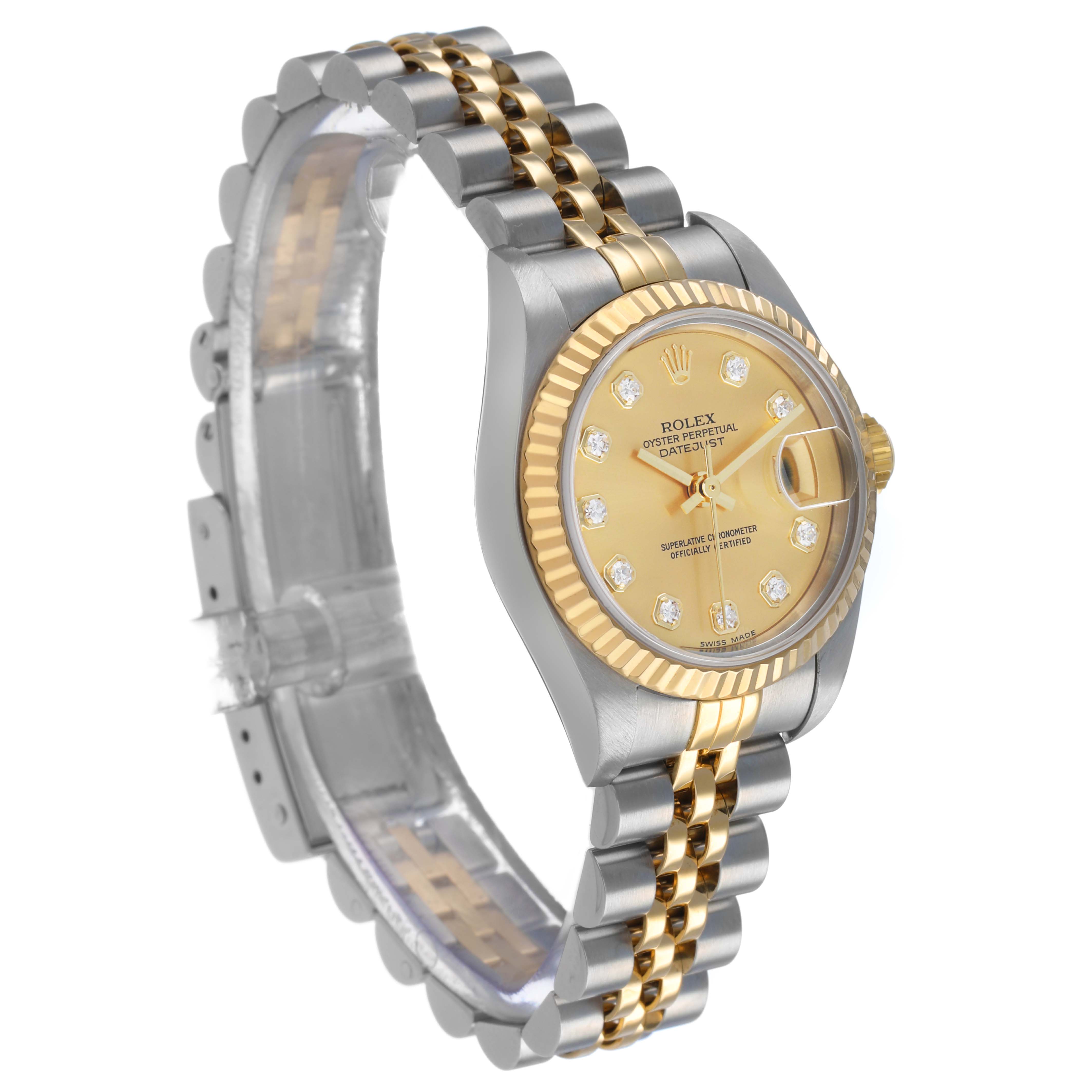 The Rolex Datejust 79173 Women's Steel and Gold (two tone) Champagne Dial watch is shown at a three-quarter angle, highlighting its dial, bezel, and two-tone bracelet.