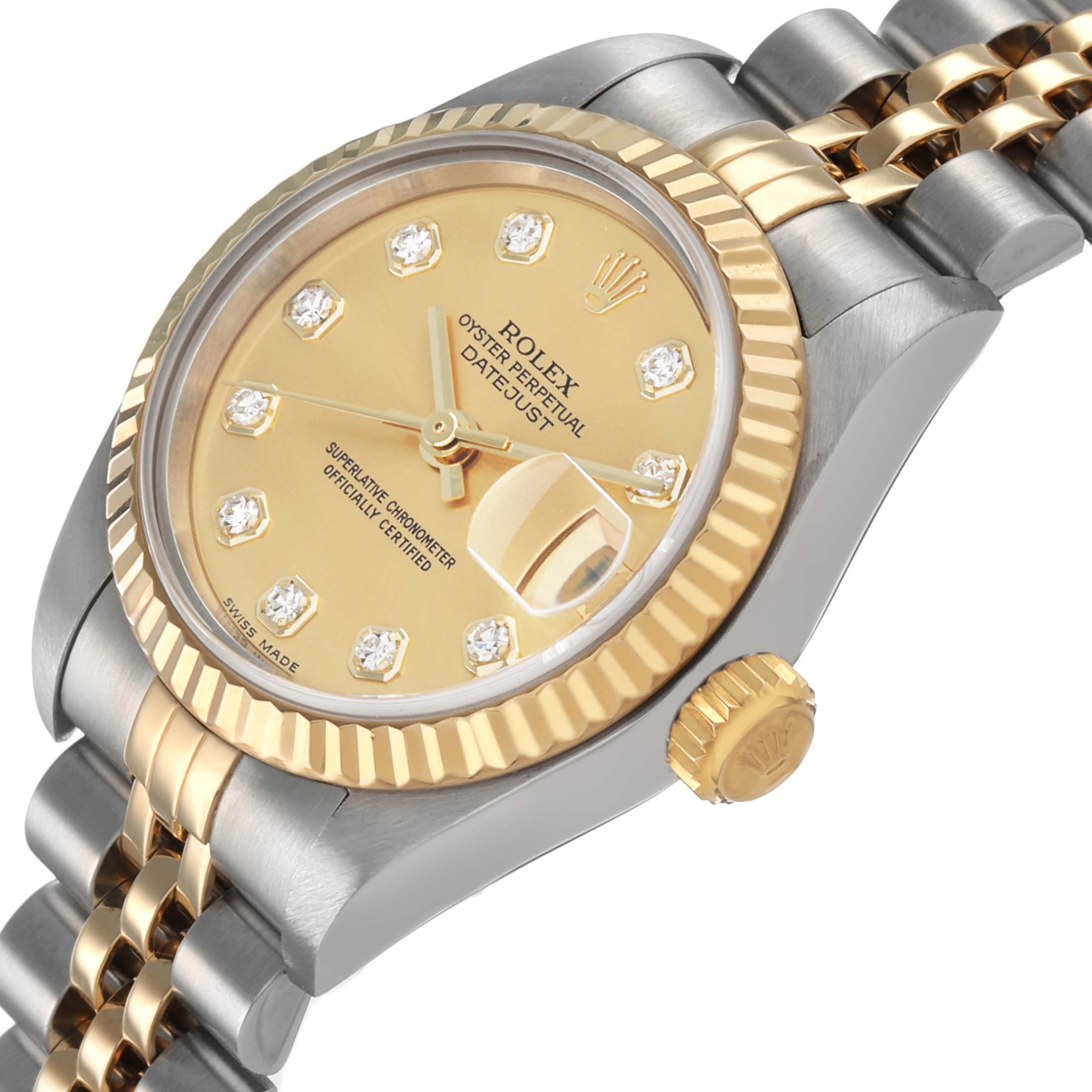 The image shows a Rolex Datejust 79173 Women's Steel and Gold (two tone) Champagne Dial watch at an angled side view, highlighting the bezel, crown, dial, and bracelet.