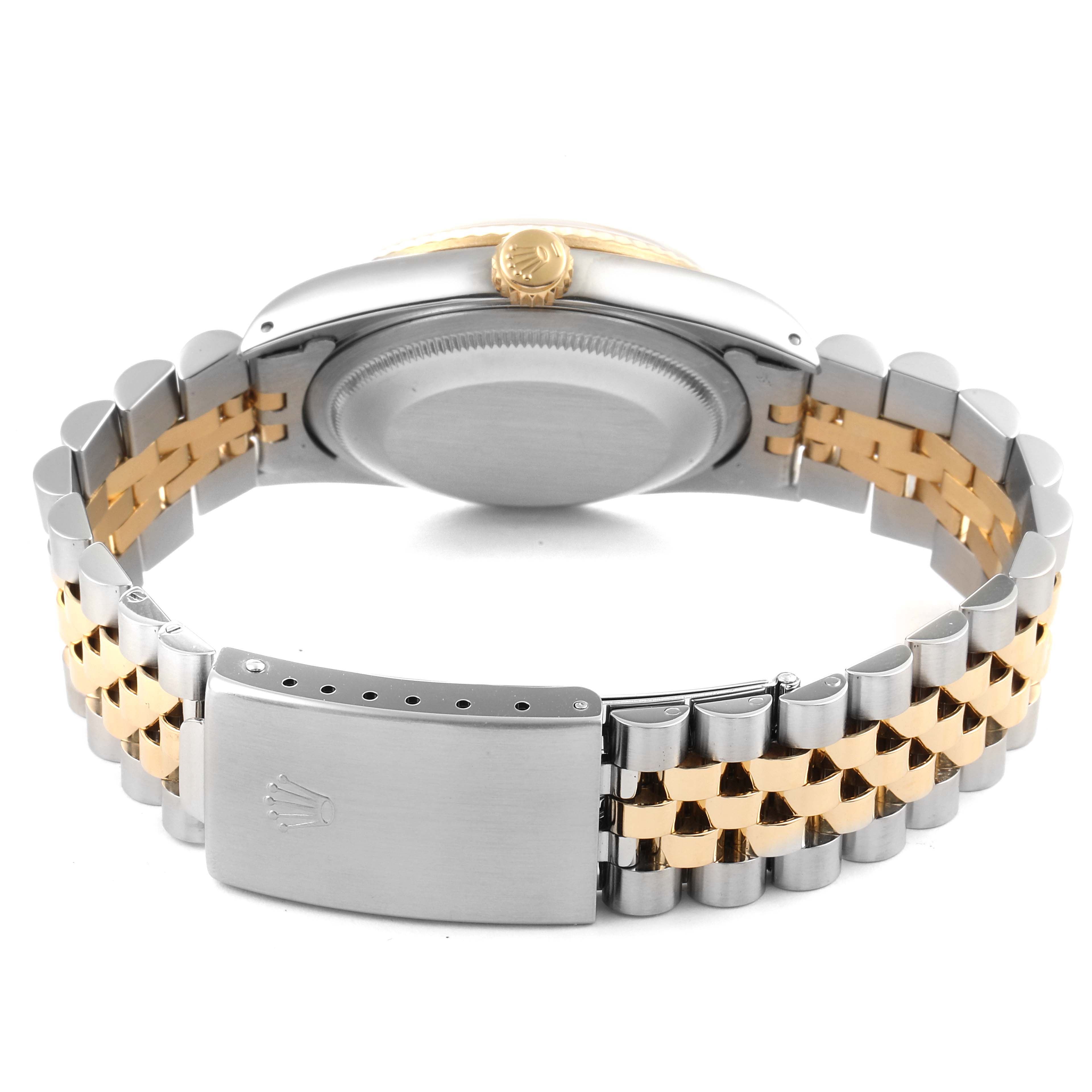 The image shows the back of a Rolex Datejust 16233 Men's Steel and Gold (two tone) Champagne Dial 16233 Men's Steel and Gold (two tone) Champagne Dial watch, highlighting the Jubilee bracelet and clasp.