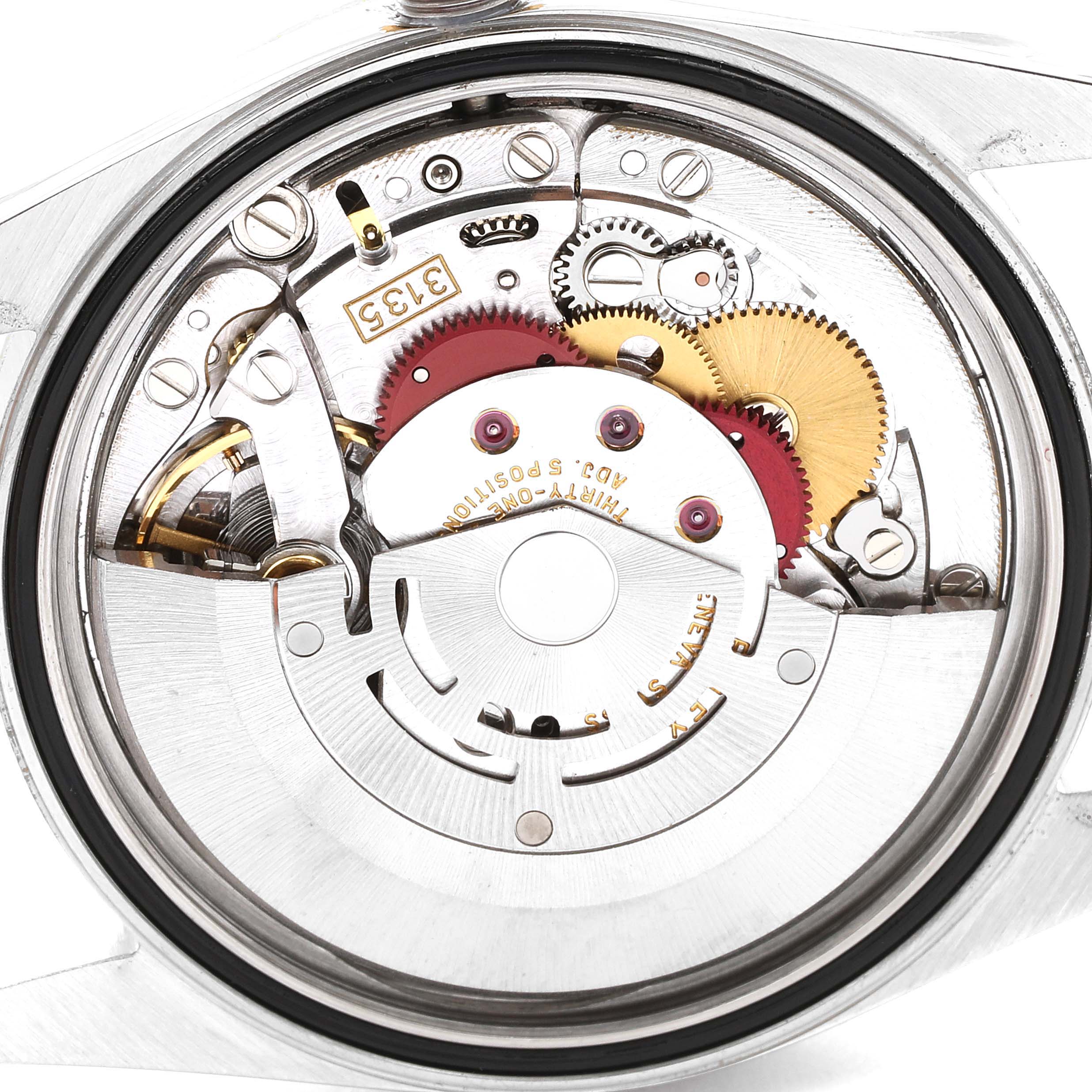 This image shows the inner mechanical movement from a rear angle of the Rolex Datejust 16233 Men's Steel and Gold (two tone) Champagne Dial 16233 Men's Steel and Gold (two tone) Champagne Dial watch, highlighting gears and other components.