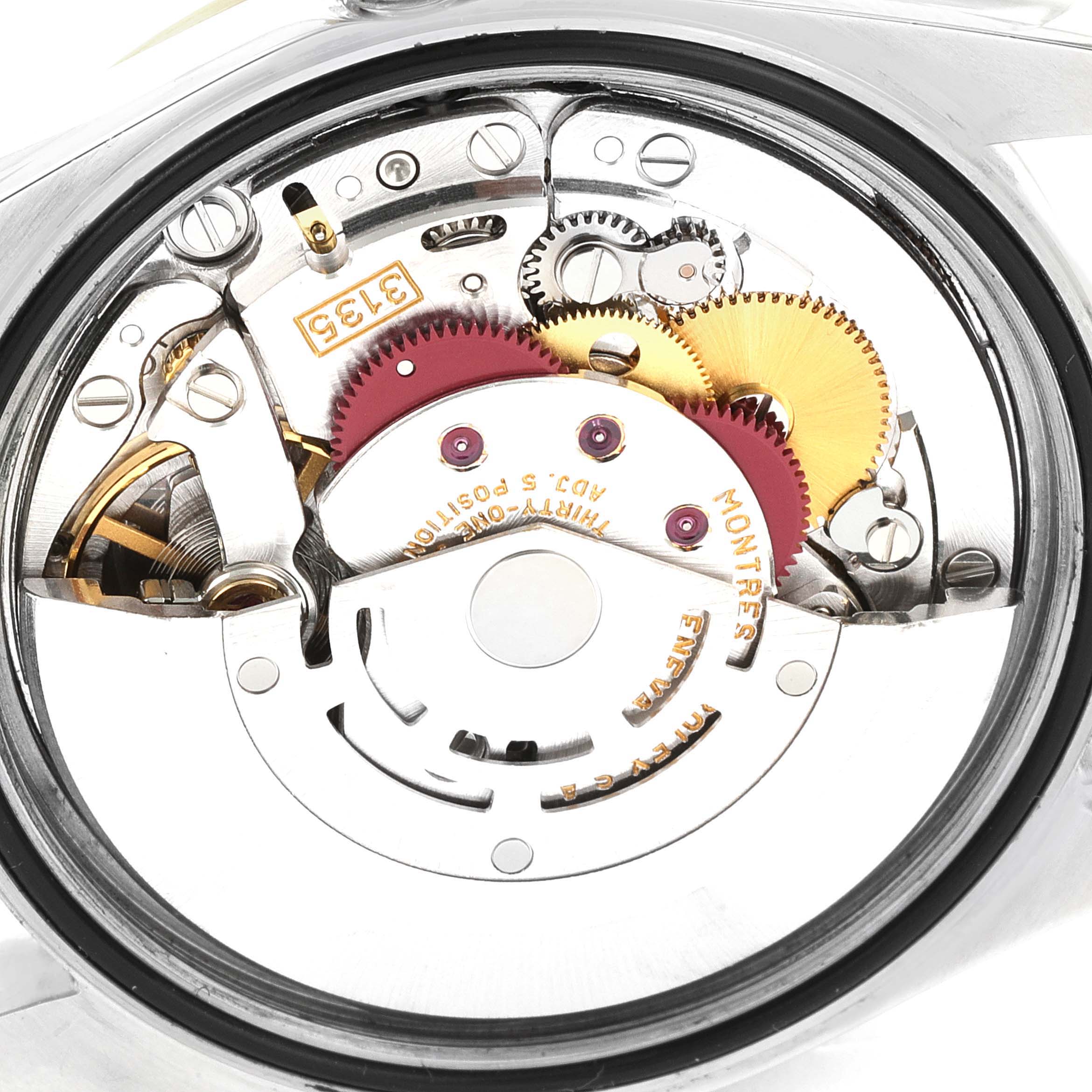 This image shows the movement mechanism of a Rolex Datejust 16233 Men's Steel and Gold (two tone) Champagne Dial 16233 Men's Steel and Gold (two tone) Champagne Dial watch, highlighting gears and internal components.