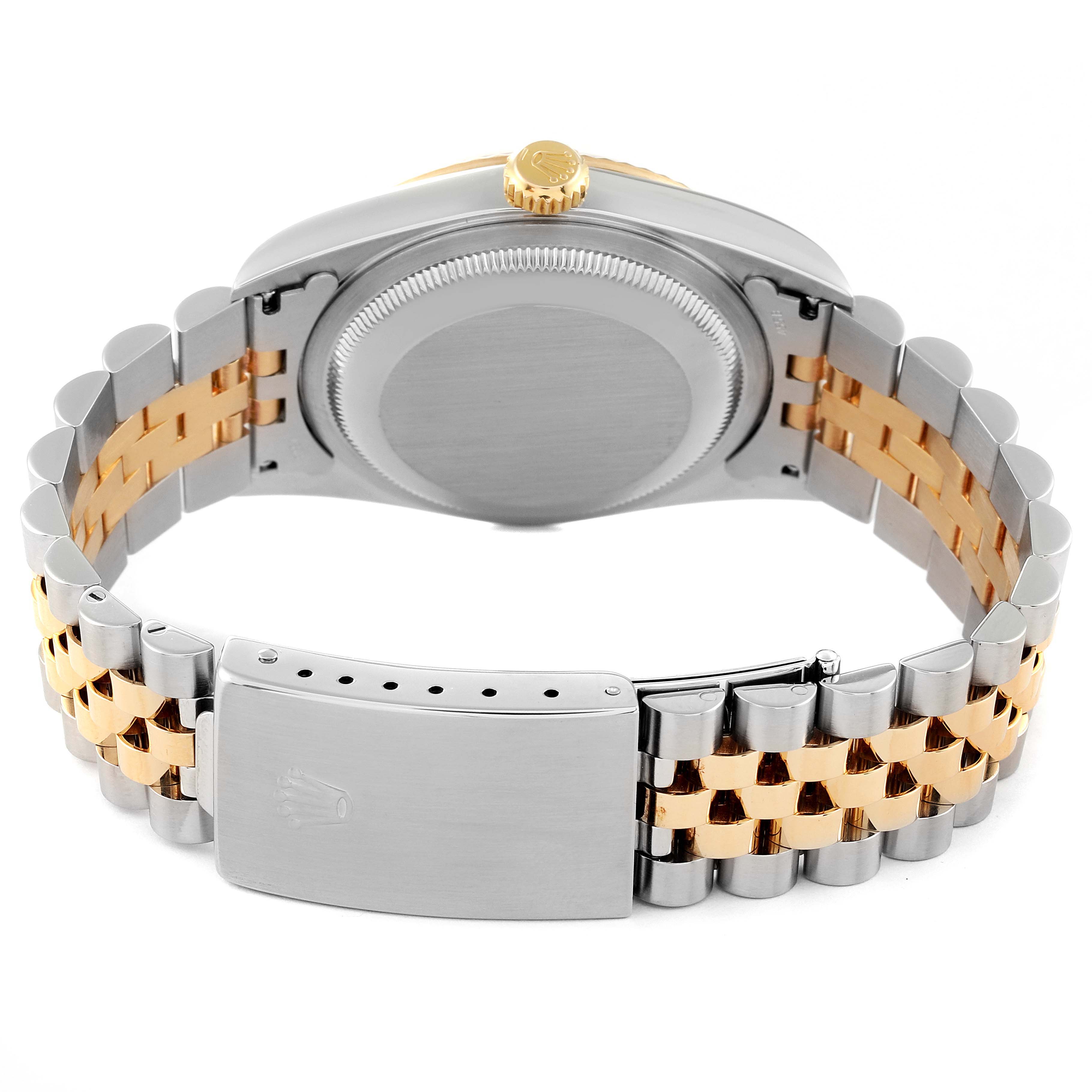 This image shows the back of a Rolex Datejust 16233 Men's Steel and Gold (two tone) Silver Dial 16233 Men's Steel and Gold (two tone) Silver Dial watch, focusing on the bracelet, clasp, and case back.