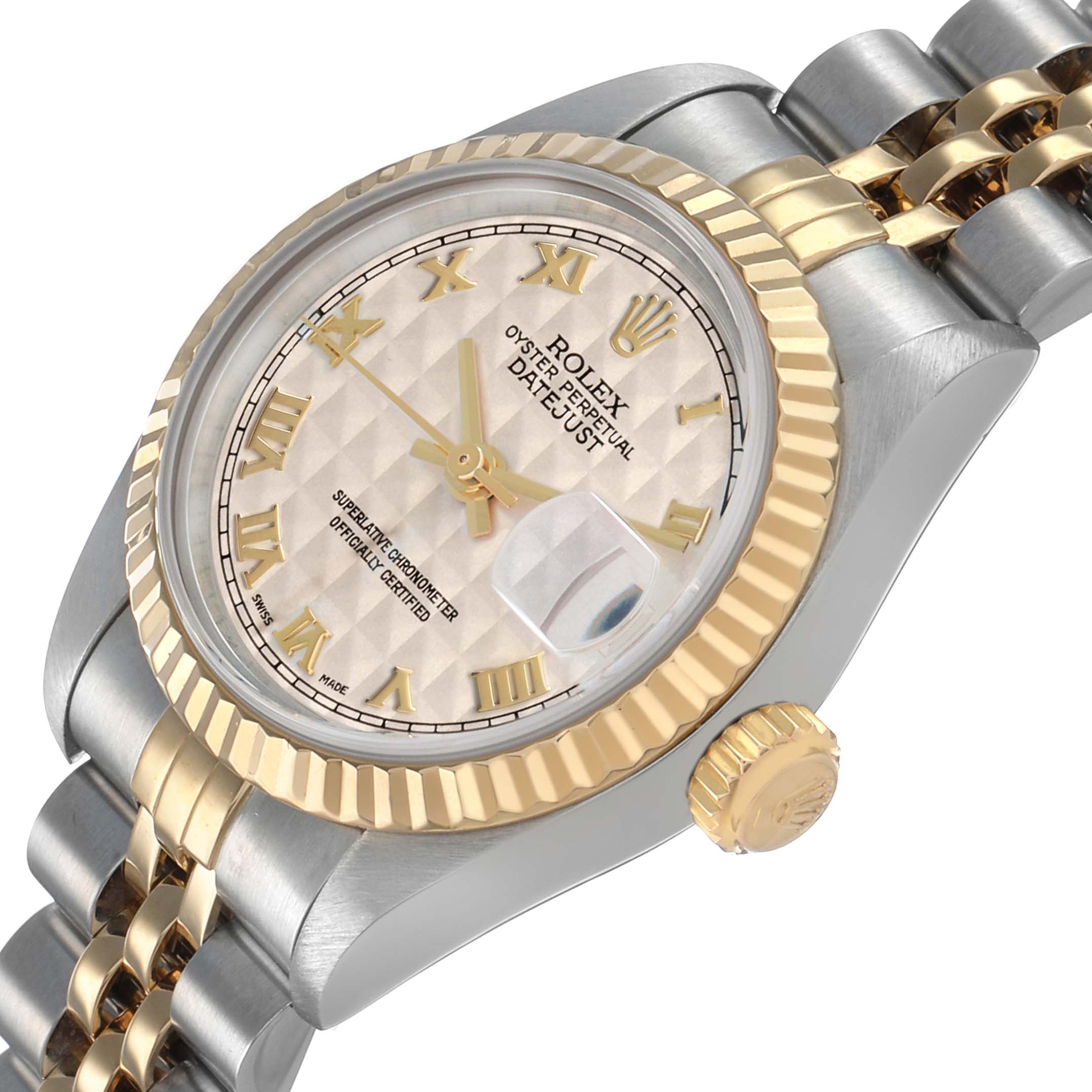 The Rolex Datejust 79173 Women's Steel and Gold (two tone) White Dial watch is shown at an angled view displaying the dial, bezel, crown, and bracelet.