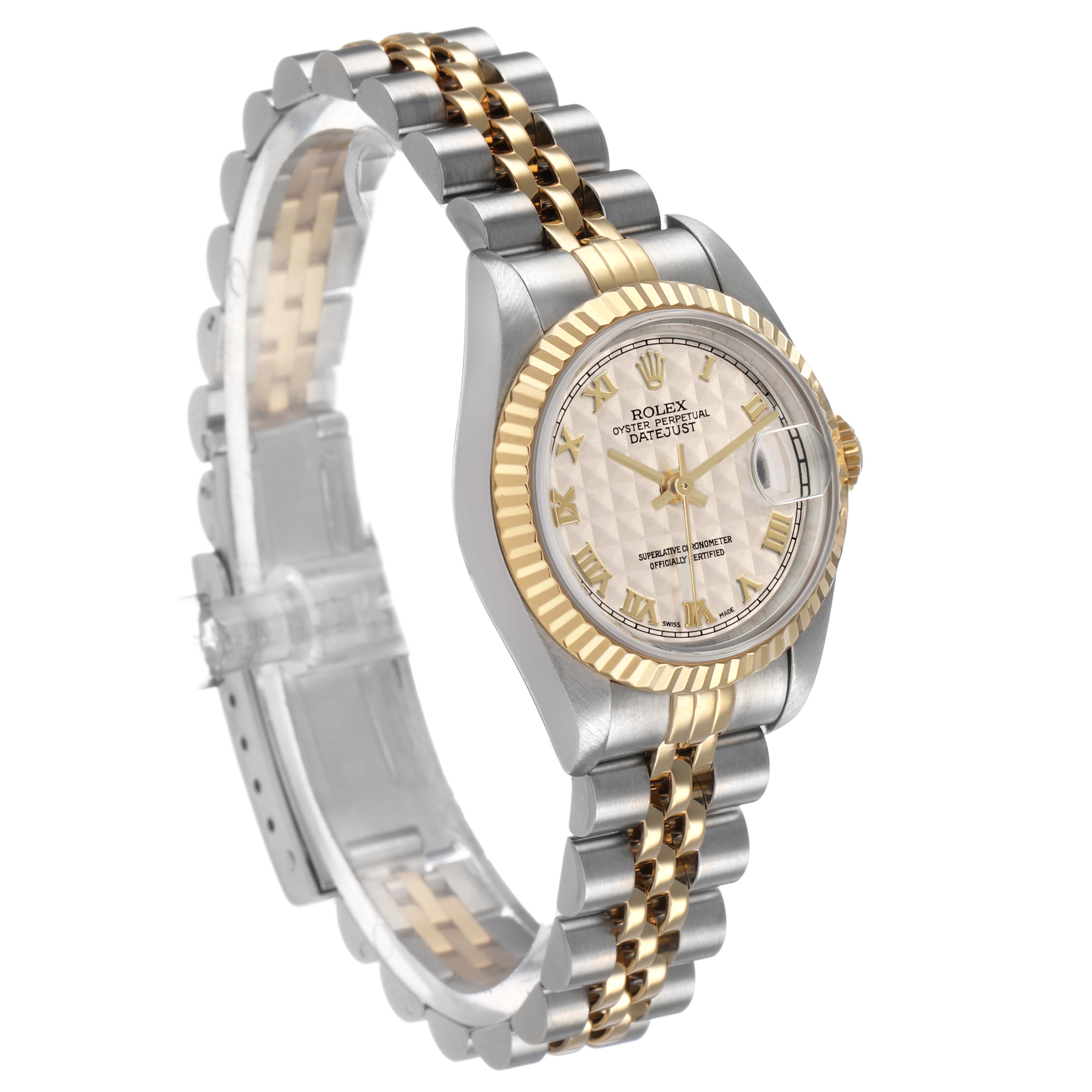 The Rolex Datejust 79173 Women's Steel and Gold (two tone) White Dial watch is shown at an angled view displaying the face, two-tone bracelet, and fluted bezel.