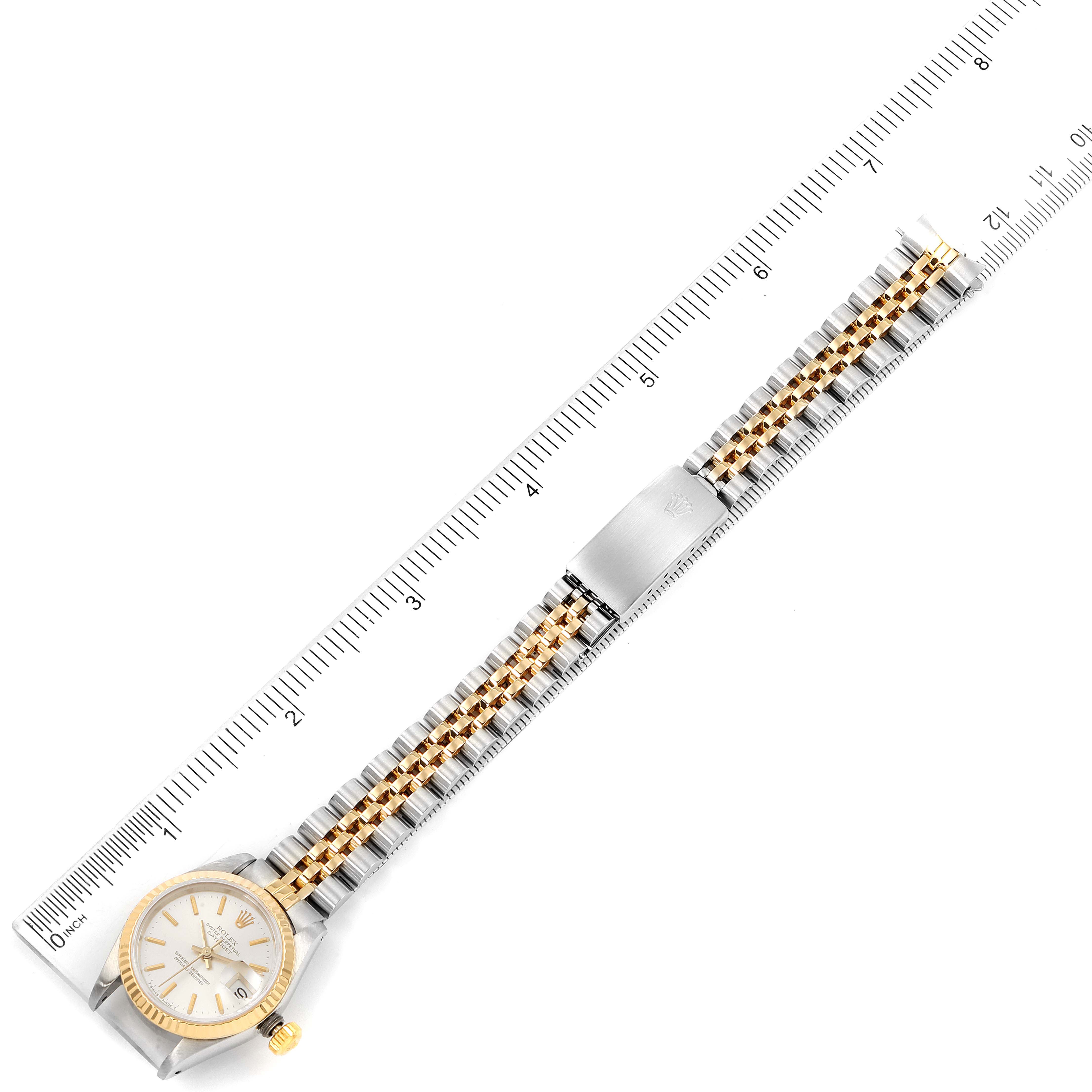 The image shows a top-down view of a Rolex Datejust 69173 Women's Steel and Gold (two tone) Silver Dial 69173 Women's Steel and Gold (two tone) Silver Dial model watch, highlighting its face and two-tone metal bracelet.