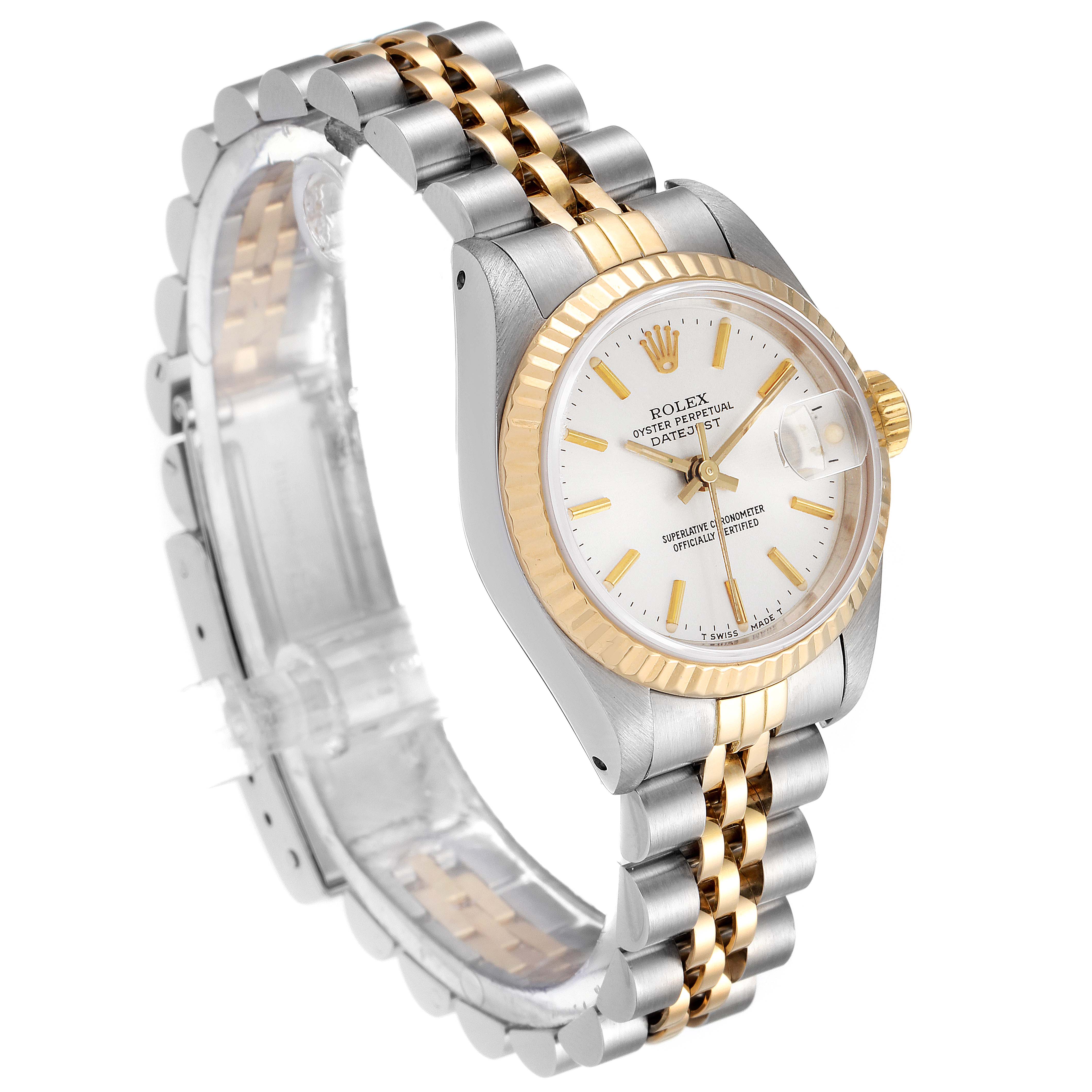 The Rolex Datejust 69173 Women's Steel and Gold (two tone) Silver Dial 69173 Women's Steel and Gold (two tone) Silver Dial watch is shown at a three-quarter angle, highlighting its silver and gold bracelet, fluted bezel, and white dial.