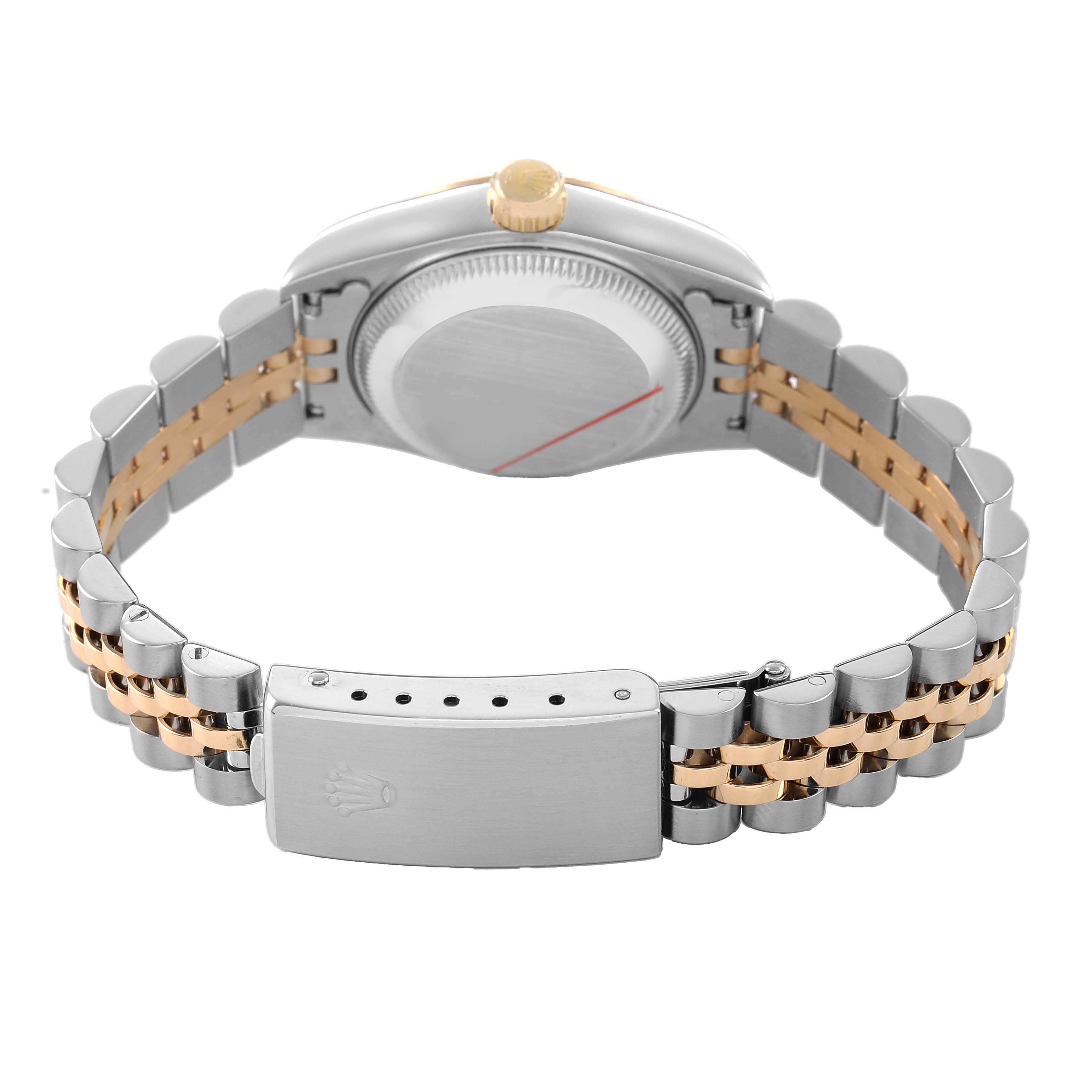 The image shows the back of a Rolex Datejust 69173 Women's Steel and Gold (two tone) Yellow Dial, focusing on the case back and Jubilee bracelet with a visible clasp.