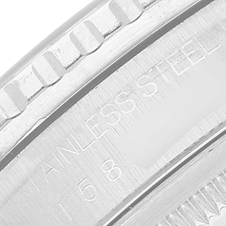 This image shows a close-up angle of the bezel and the engraved inner ring of a Rolex Turn-o-Graph 16264 Men's Stainless Steel Black Dial 16264 Men's Stainless Steel Black Dial watch, highlighting the "Stainless Steel" marking.