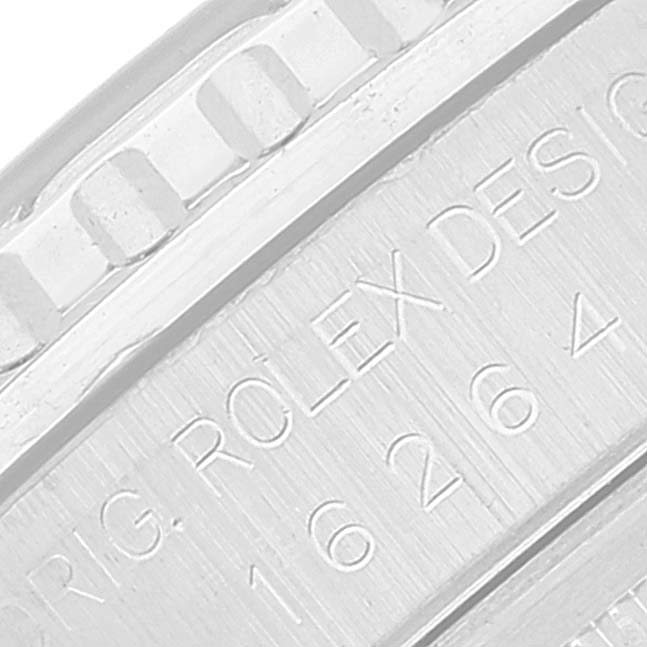 The image shows a close-up of the bezel and engraved serial number on a Rolex Turn-o-Graph 16264 Men's Stainless Steel Black Dial 16264 Men's Stainless Steel Black Dial watch.