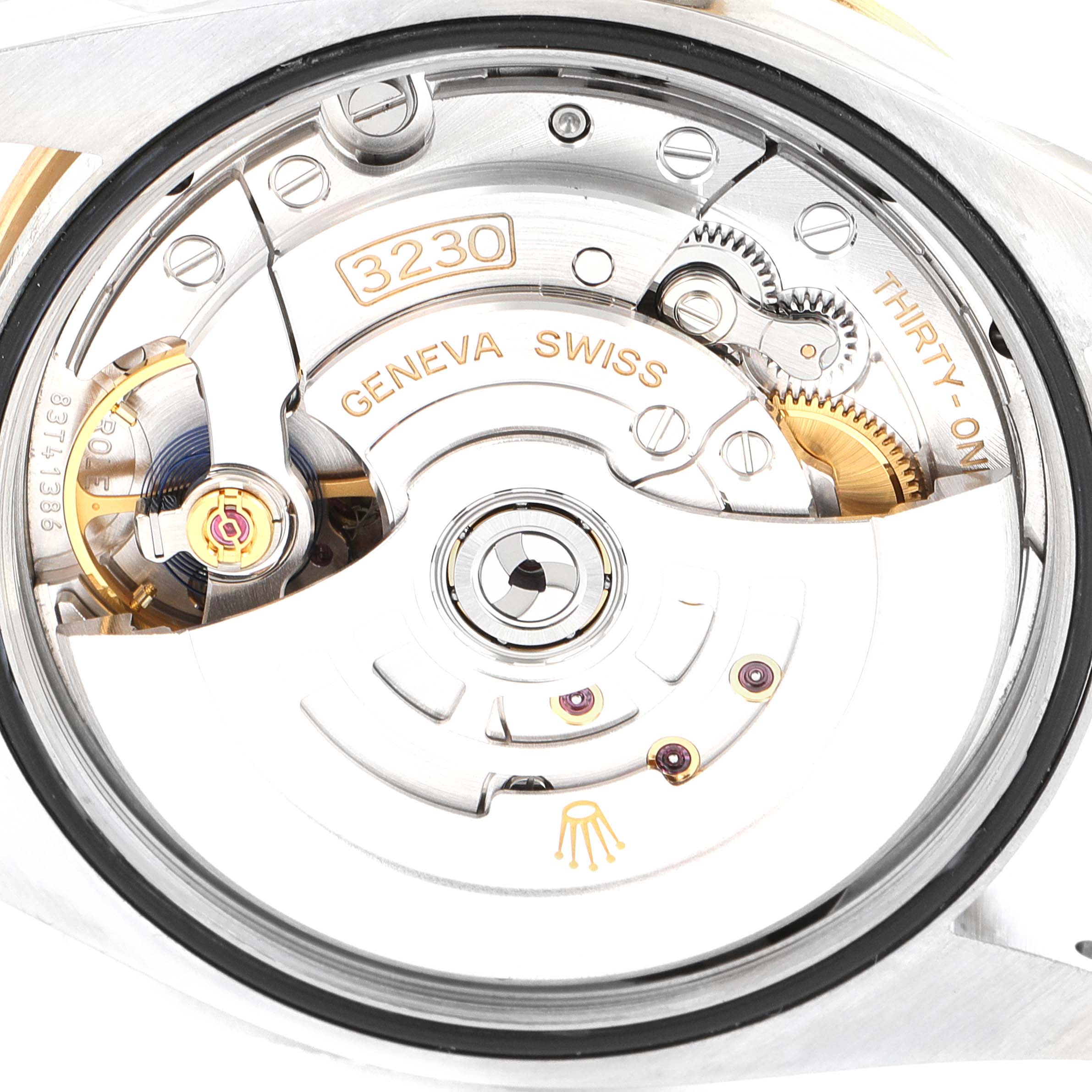 The image shows the inner mechanics and movement of a Rolex Explorer 124273 Men's Steel and Gold (two tone) Black Dial 124273 Men's Steel and Gold (two tone) Black Dial watch, specifically the calibre 3230.