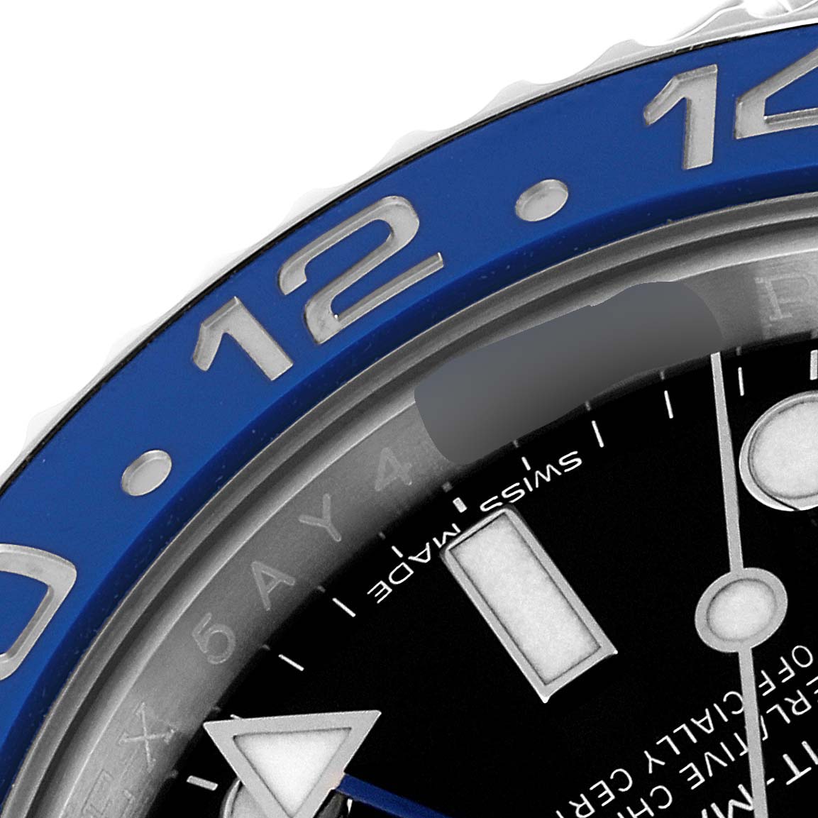 This close-up image of the Rolex GMT-Master 116710 Men's Stainless Steel Black Dial 116710 Men's Stainless Steel Black Dial watch shows a section of the blue bezel and part of the dial with markers.