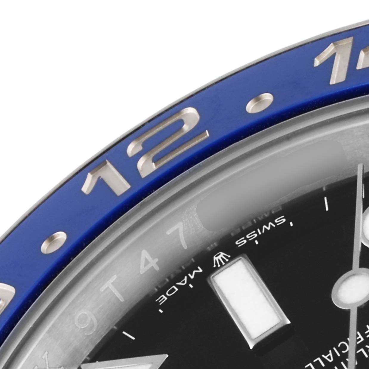 This image shows a close-up of the bezel and dial of a Rolex GMT-Master 126710 Men
s Stainless Steel Black Dial 126710 Men
s Stainless Steel Black Dial watch, focusing on the blue segment and hour markers.