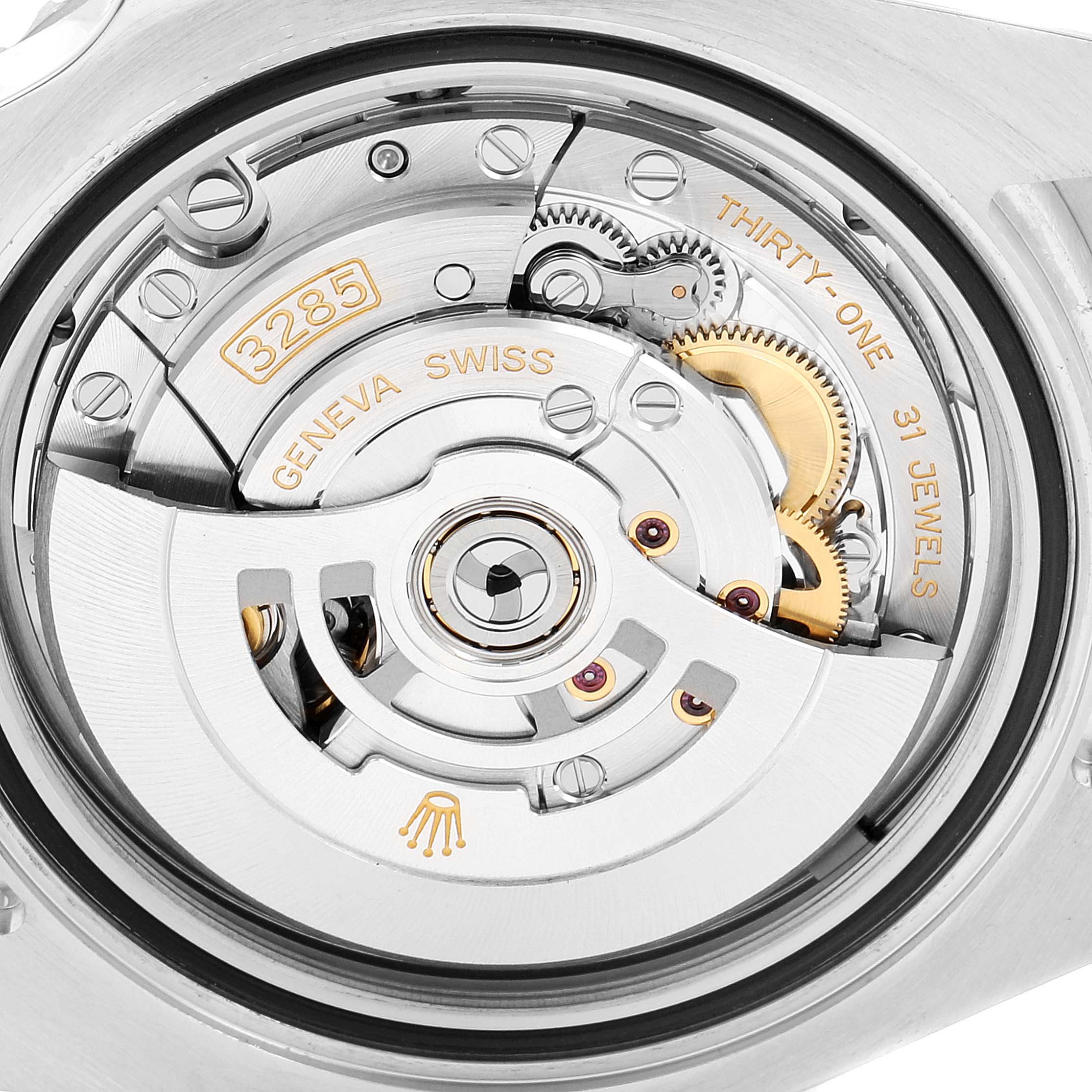 The image shows the movement mechanism of a Rolex GMT-Master 126710 Men
s Stainless Steel Black Dial 126710 Men
s Stainless Steel Black Dial watch, focusing on the intricate inner workings and components.