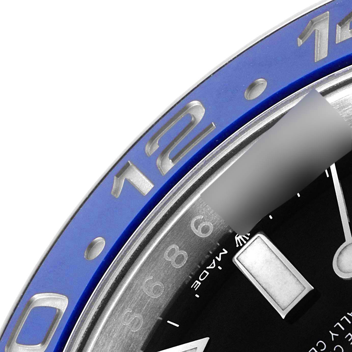 The image shows a close-up angle of the bezel and part of the dial of a Rolex GMT-Master 126710 Men
s Stainless Steel Black Dial 126710 Men
s Stainless Steel Black Dial watch.