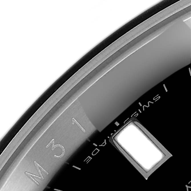 The image shows a close-up of the bezel and dial of a Rolex GMT-Master 116710 Men's Stainless Steel Black Dial 116710 Men's Stainless Steel Black Dial, highlighting the edge markers.