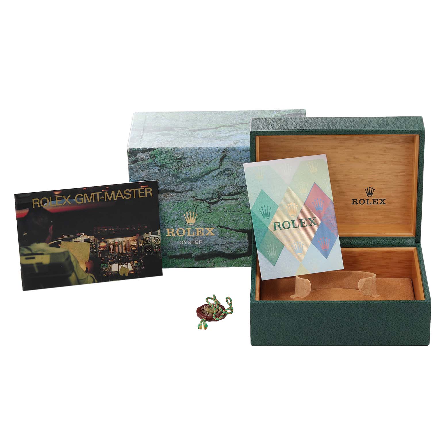 The image shows a Rolex GMT-Master 16713 Men's Steel and Gold (two tone) Brown Dial 16713 Men's Steel and Gold (two tone) Brown Dial watch box, booklets, and tags from a front angle.