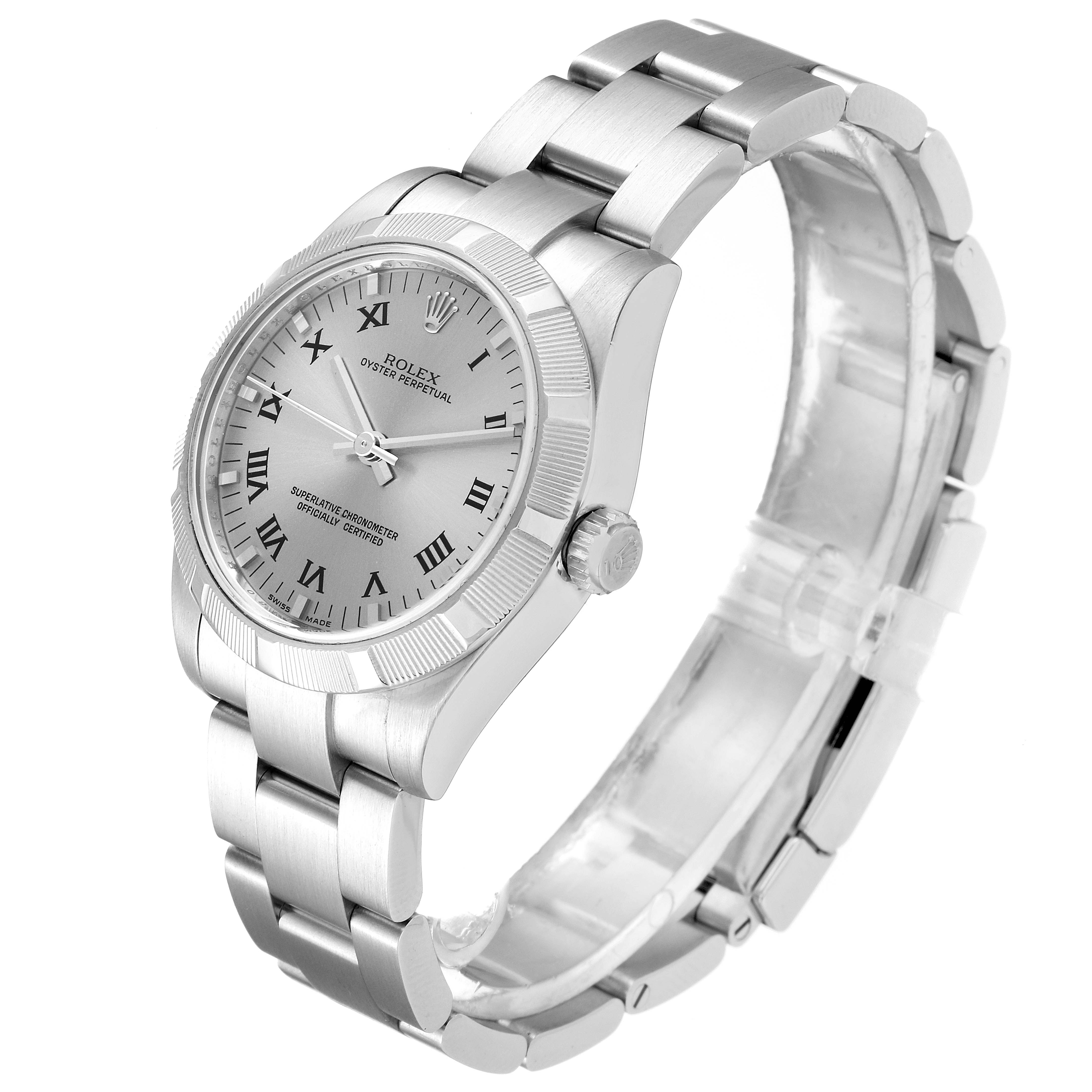 The image shows a Rolex Mid-Size 177210 Women
s Stainless Steel Silver Dial 177210 Women
s Stainless Steel Silver Dial Oyster Perpetual watch angled to display its face, crown, and bracelet.