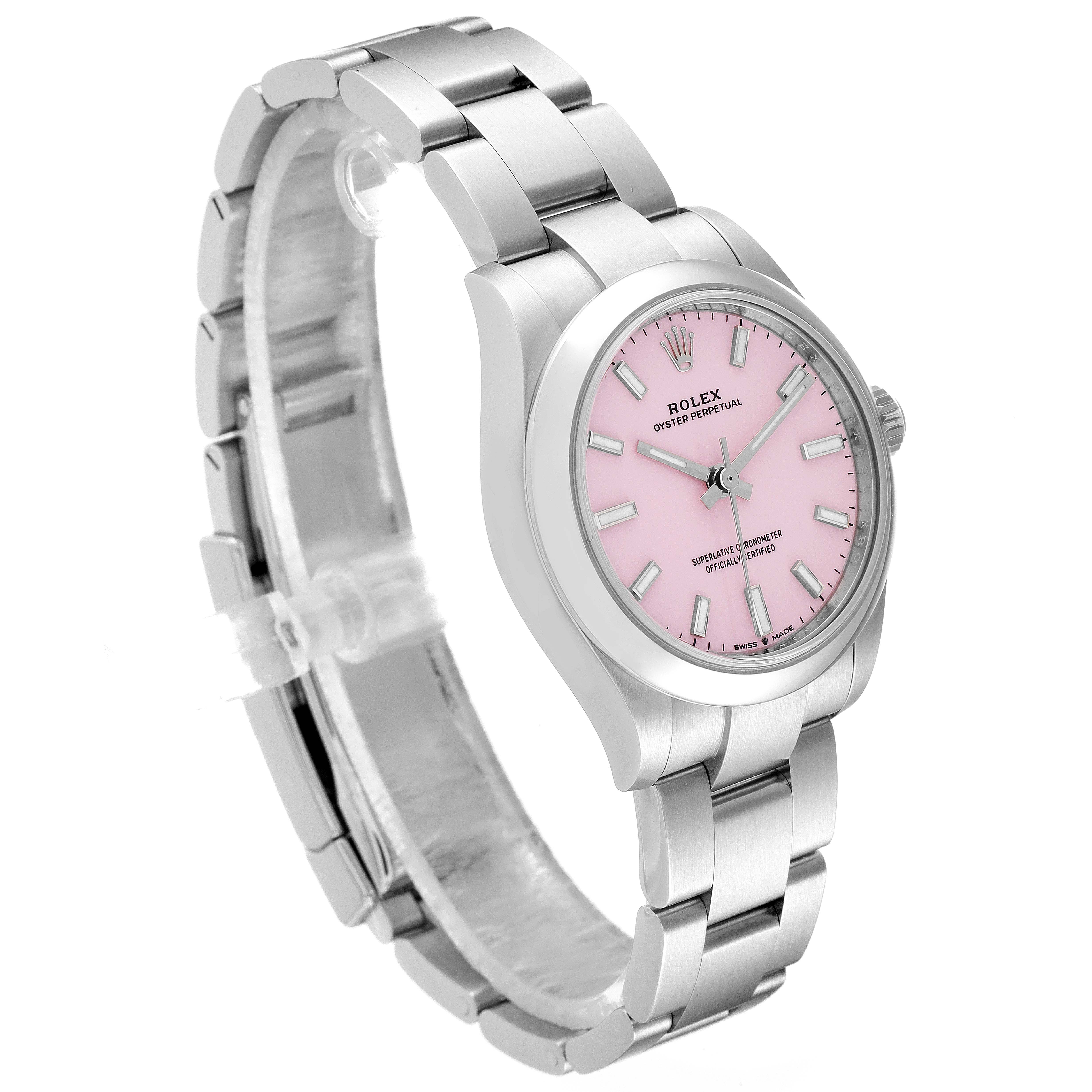 The image shows a side angle of a Mid-Size Rolex Oyster Perpetual watch with a pink dial and stainless steel bracelet.