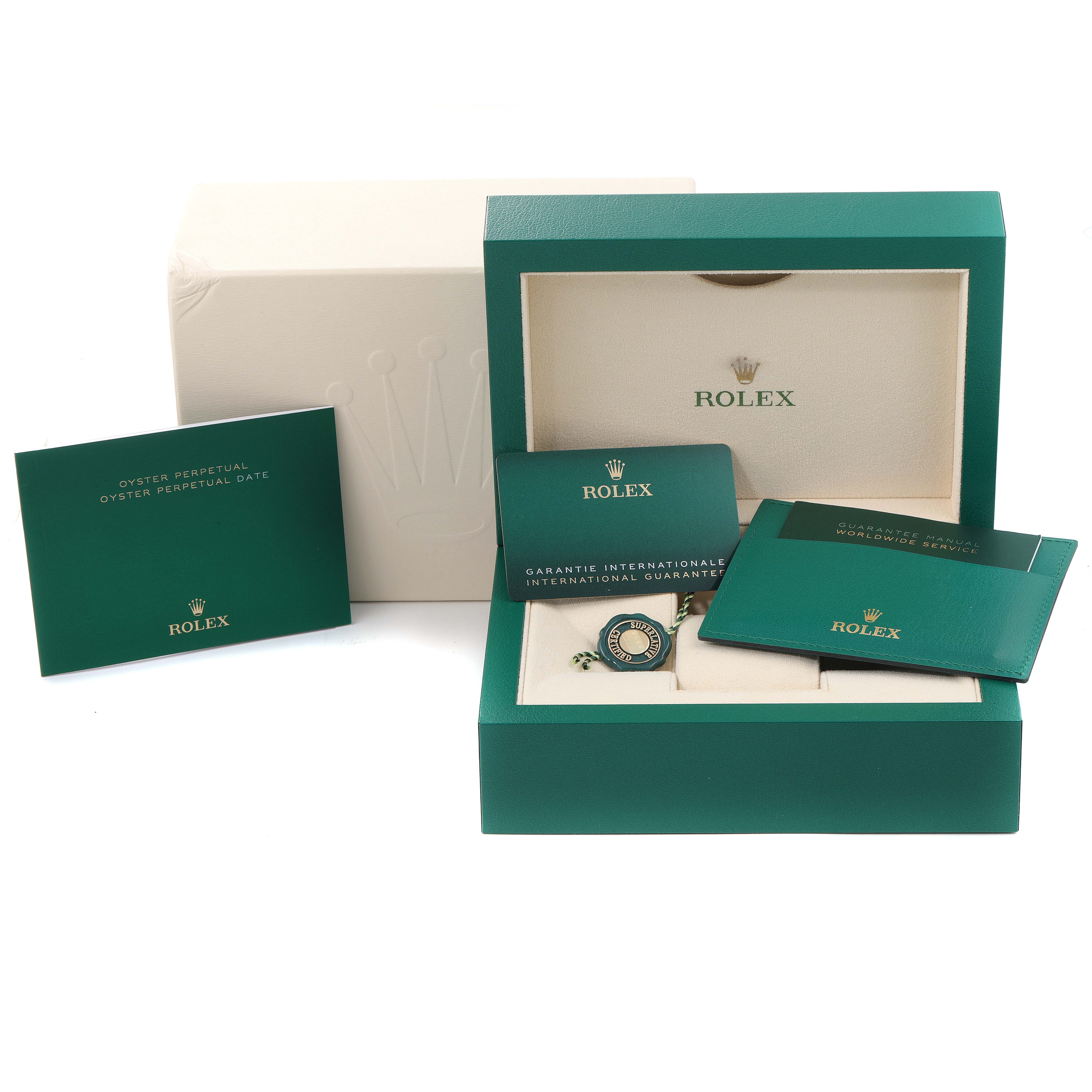 The image shows the packaging, warranty cards, and tags for a Rolex Mid-Size 42109 Women's Stainless Steel Pink Dial 42109 Women's Stainless Steel Pink Dial Oyster Perpetual Date watch.